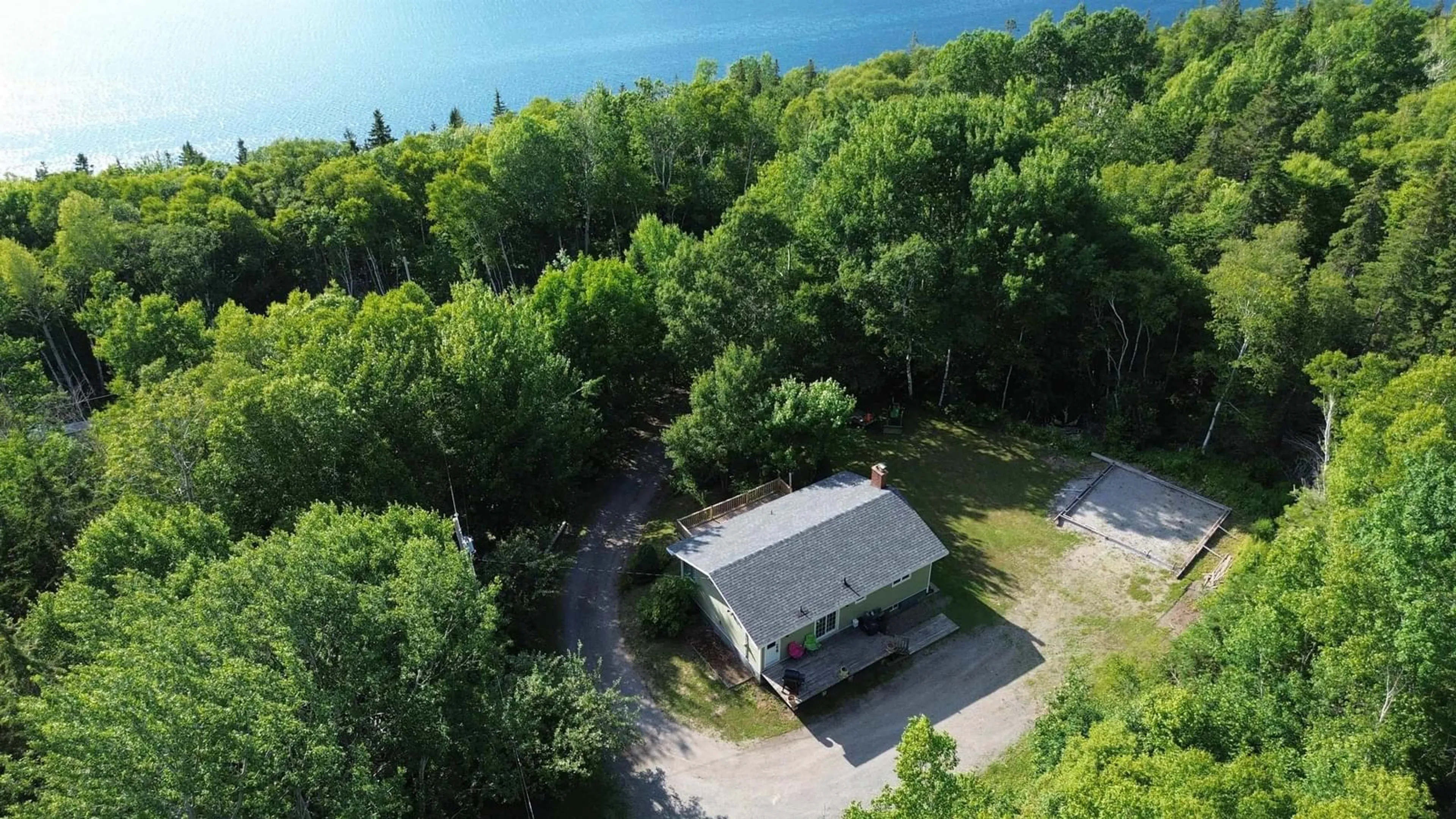 A pic from outside/outdoor area/front of a property/back of a property/a pic from drone, water/lake/river/ocean view for 3381 Long Island Rd, Long Island Nova Scotia B1Y 3N1