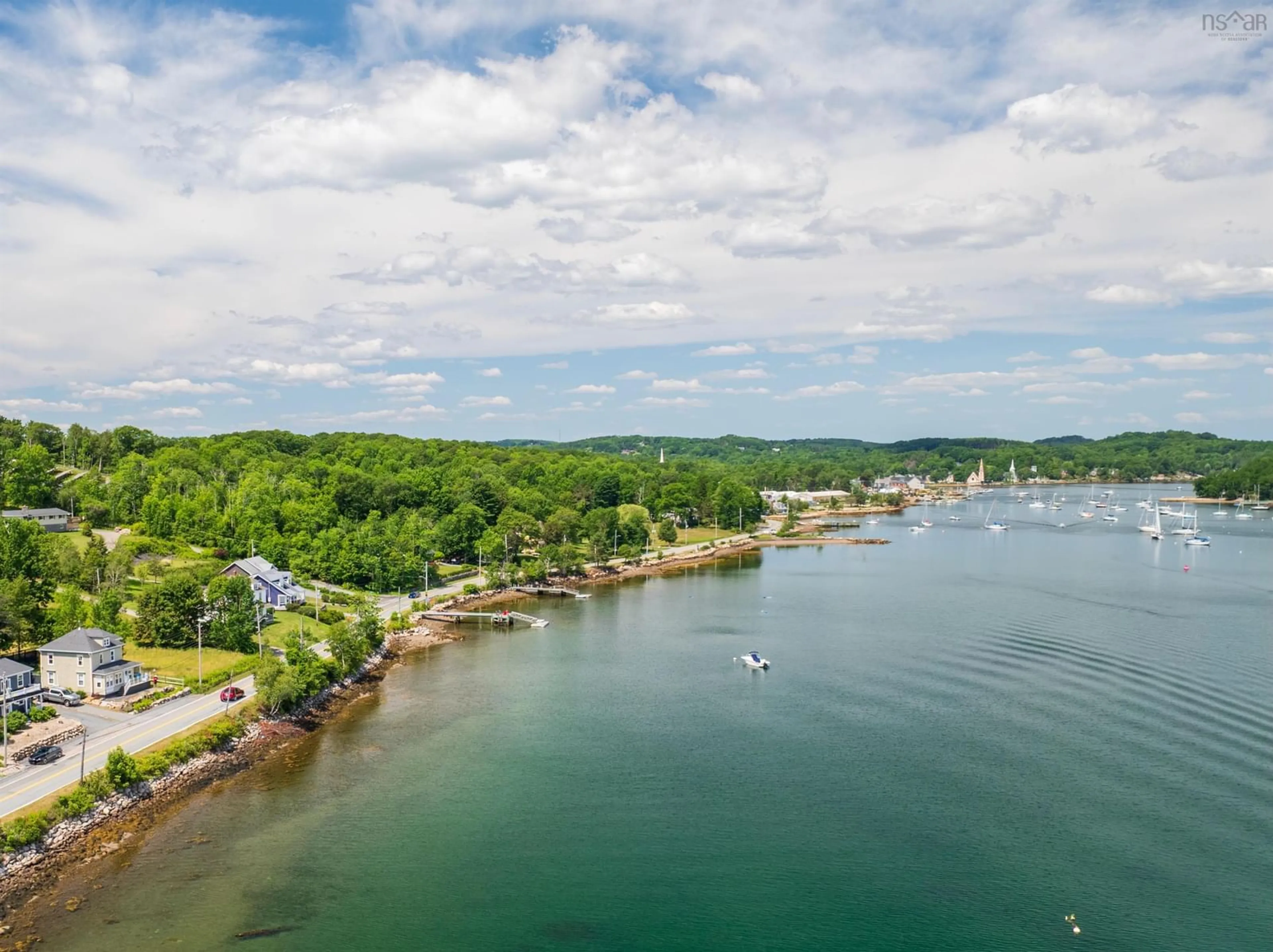 A pic from outside/outdoor area/front of a property/back of a property/a pic from drone, water/lake/river/ocean view for 958 Main St, Mahone Bay Nova Scotia B0J 2E0