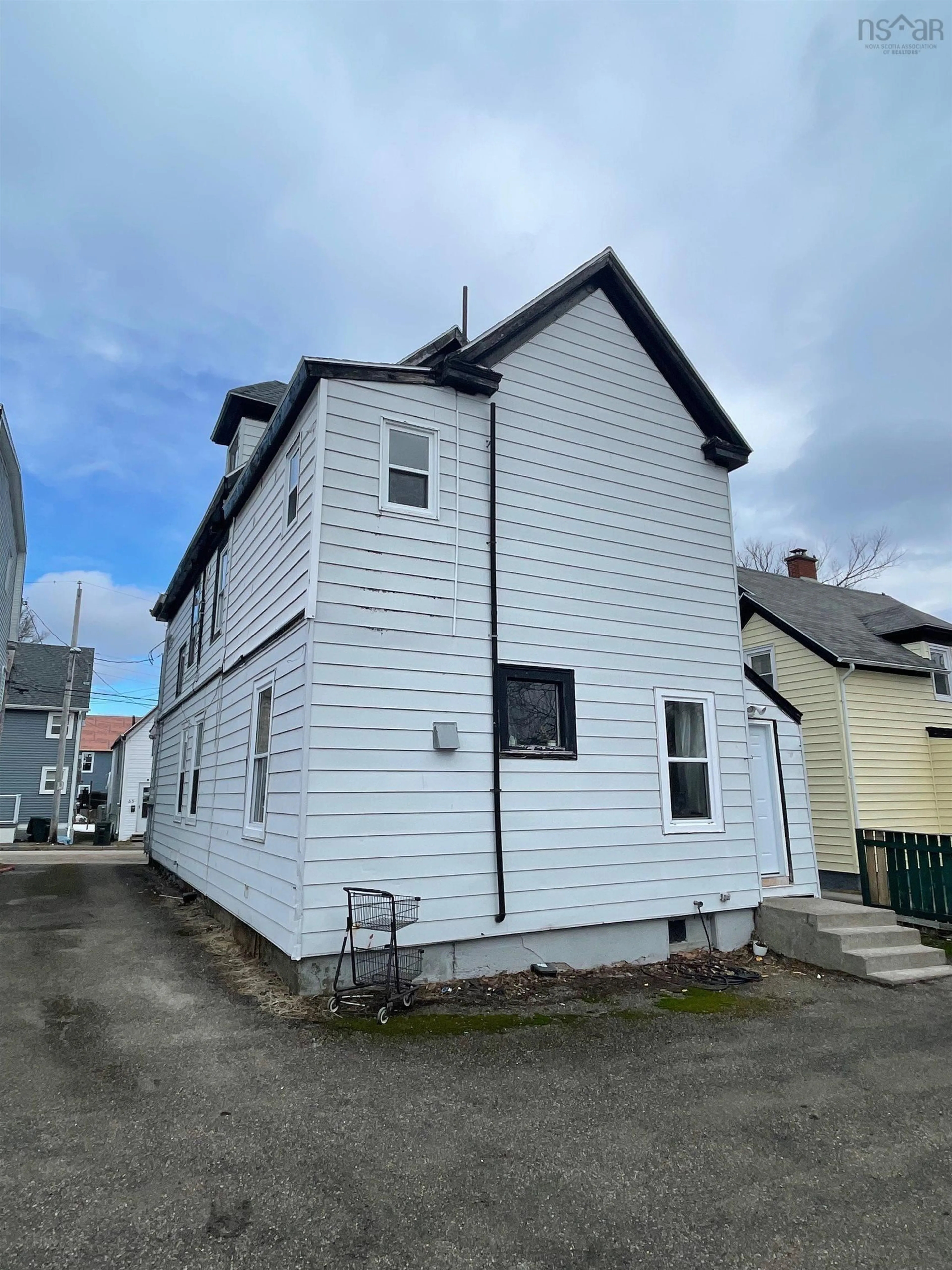A pic from outside/outdoor area/front of a property/back of a property/a pic from drone, building for 34 Amelia St, Sydney Nova Scotia B1P 6C2