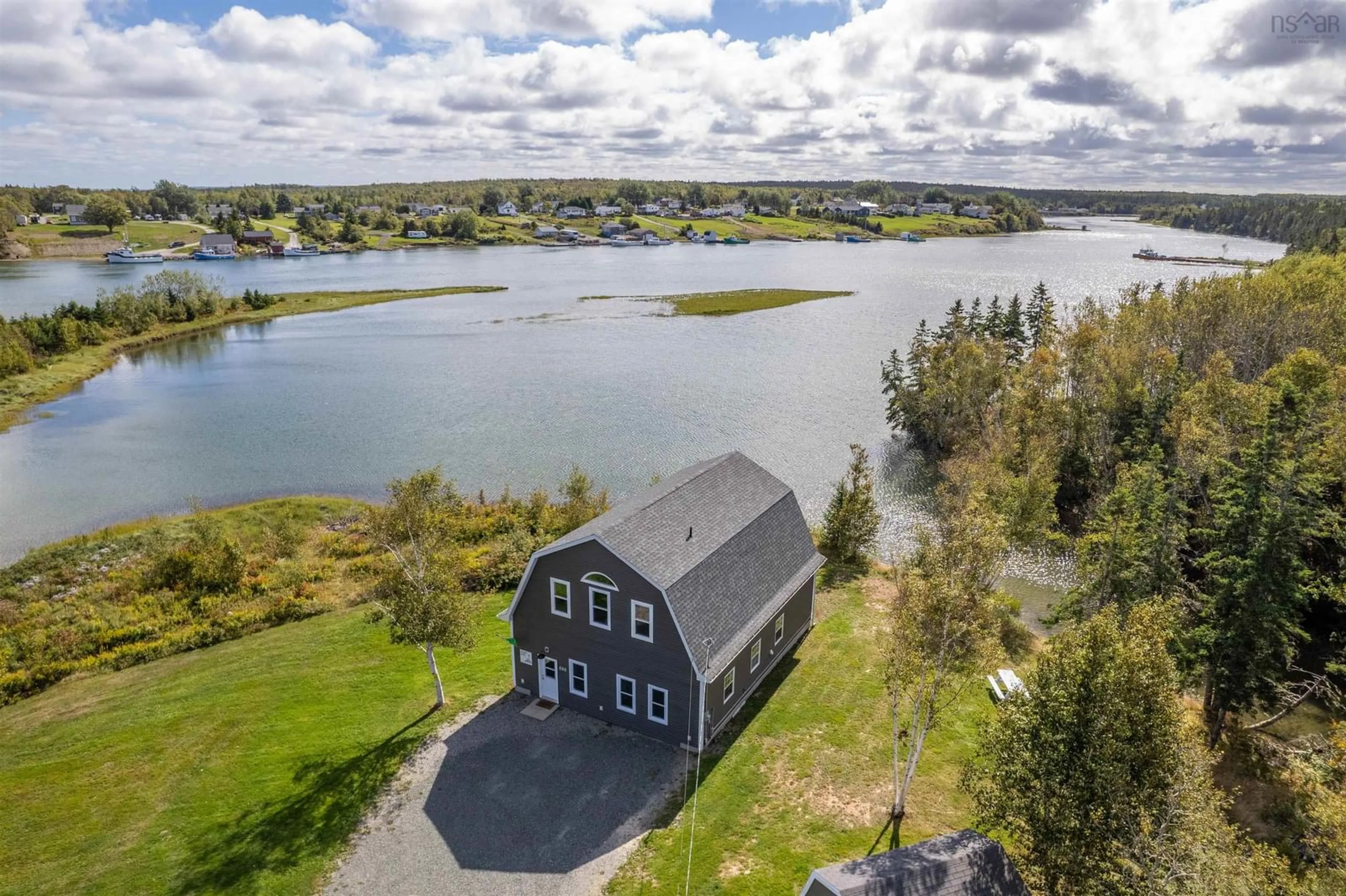 A pic from outside/outdoor area/front of a property/back of a property/a pic from drone, water/lake/river/ocean view for 696 Point Aconi Rd, Point Aconi Nova Scotia B2W 1Z2