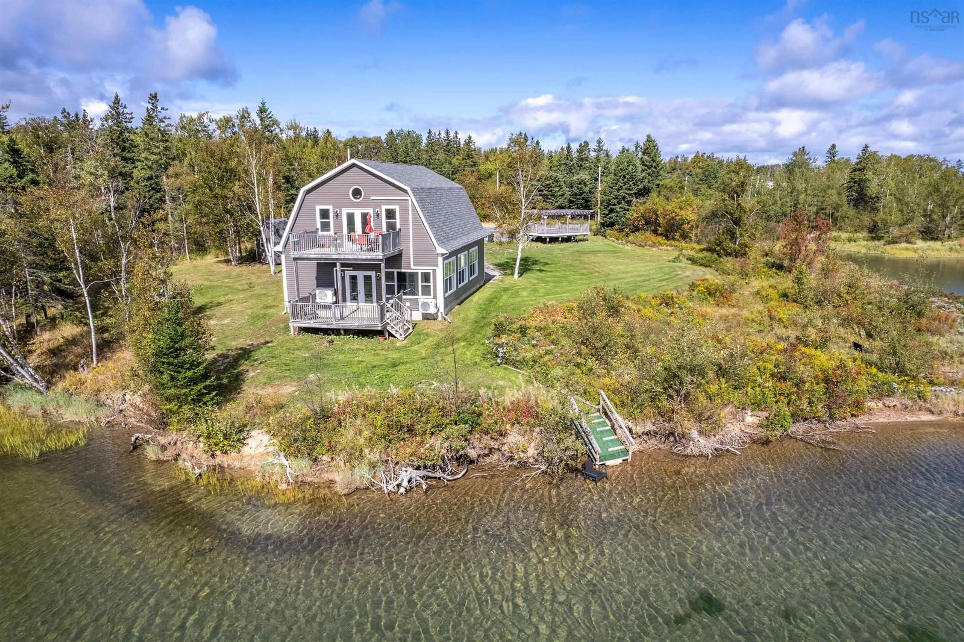 A pic from outside/outdoor area/front of a property/back of a property/a pic from drone, water/lake/river/ocean view for 696 Point Aconi Rd, Point Aconi Nova Scotia B2W 1Z2