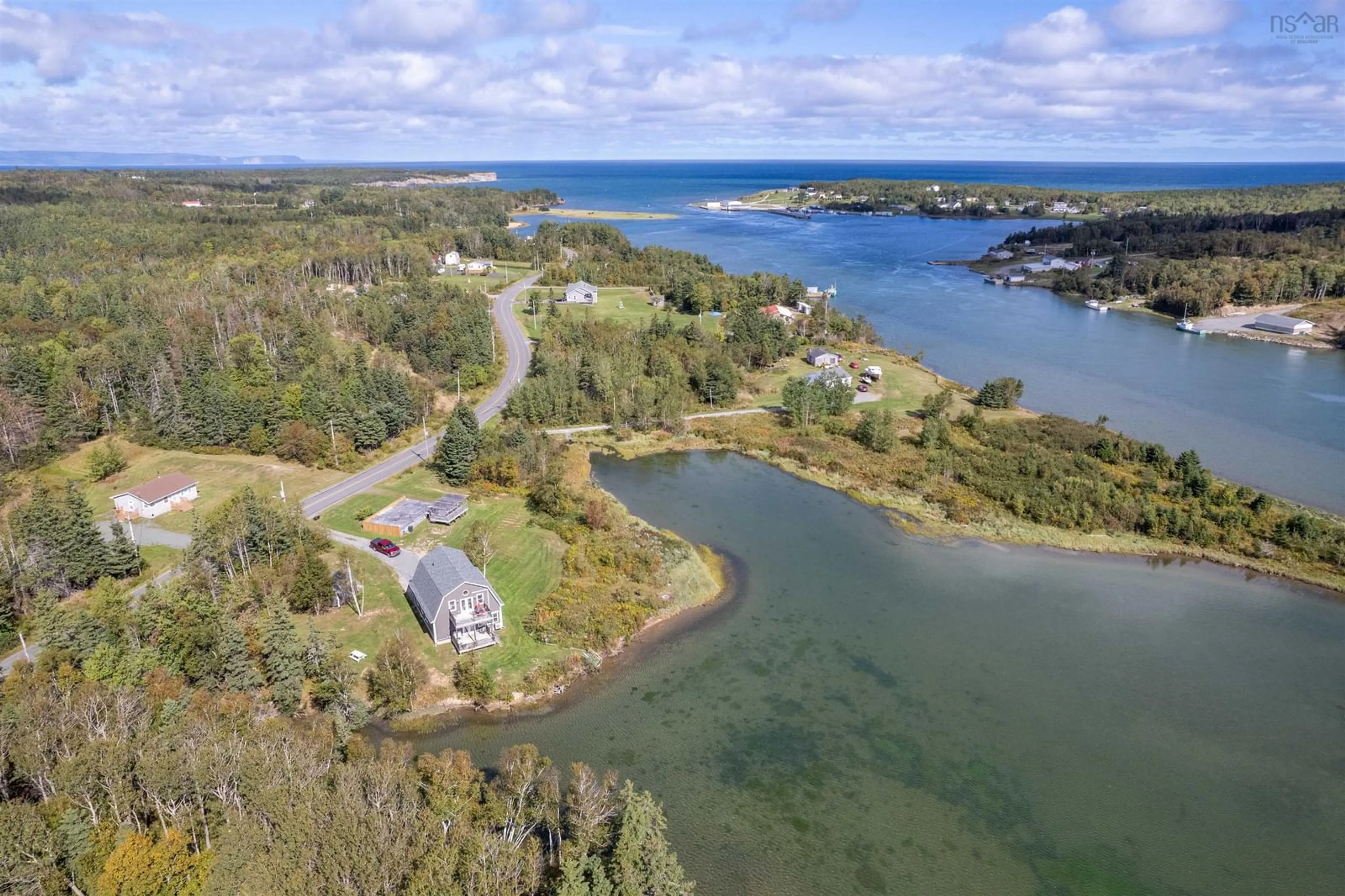 A pic from outside/outdoor area/front of a property/back of a property/a pic from drone, water/lake/river/ocean view for 696 Point Aconi Rd, Point Aconi Nova Scotia B2W 1Z2