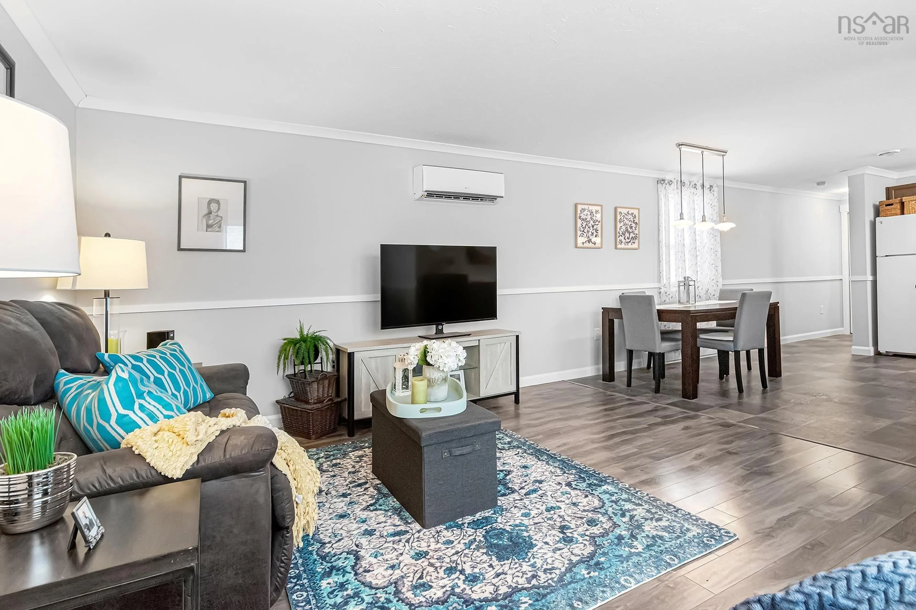 Living room with furniture, wood/laminate floor for 2 First St, Lakeside Nova Scotia B3T 1B1