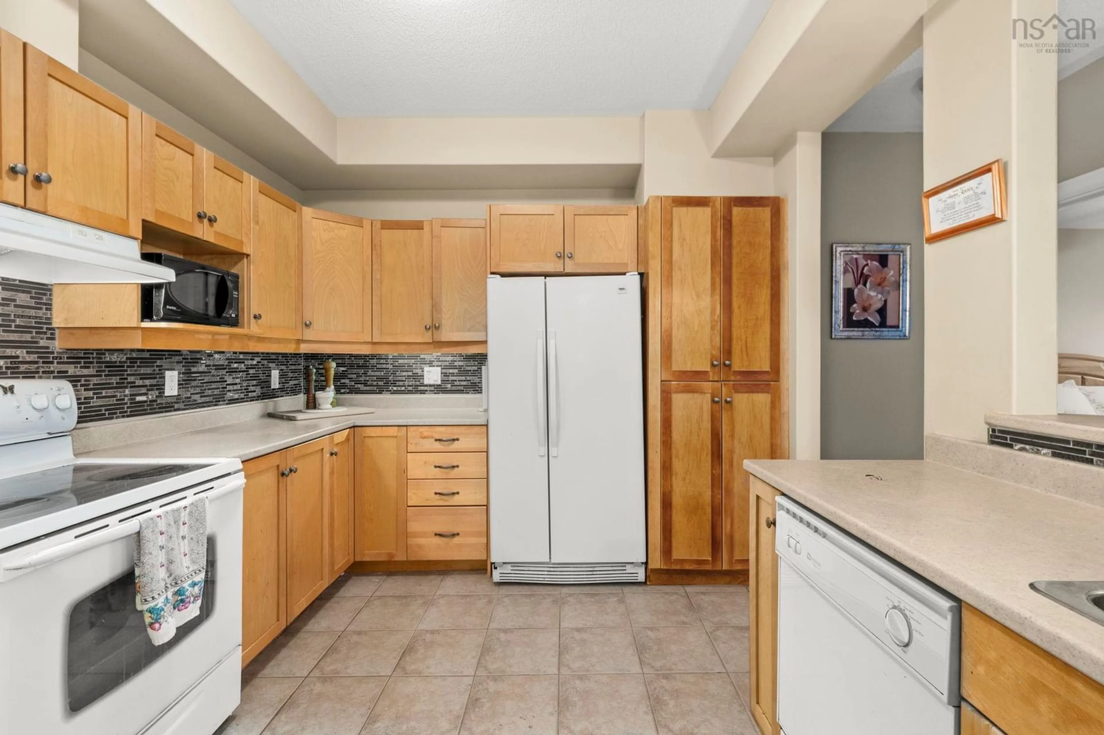 Standard kitchen, ceramic/tile floor for 277 Rutledge St #401, Bedford Nova Scotia B4A 4M2
