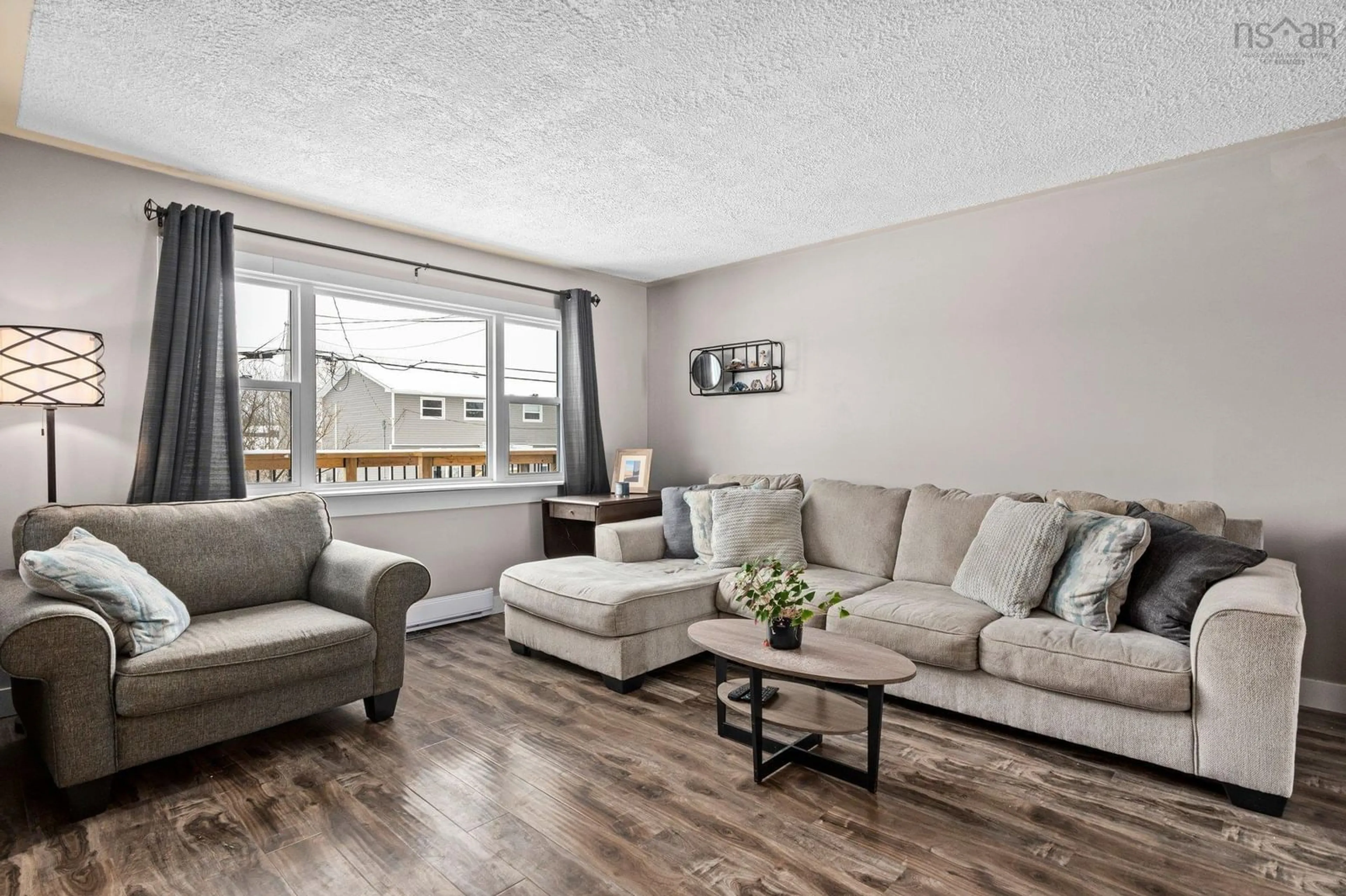 Living room with furniture, wood/laminate floor for 20 Steed Crt, Dartmouth Nova Scotia B2W 3Y8