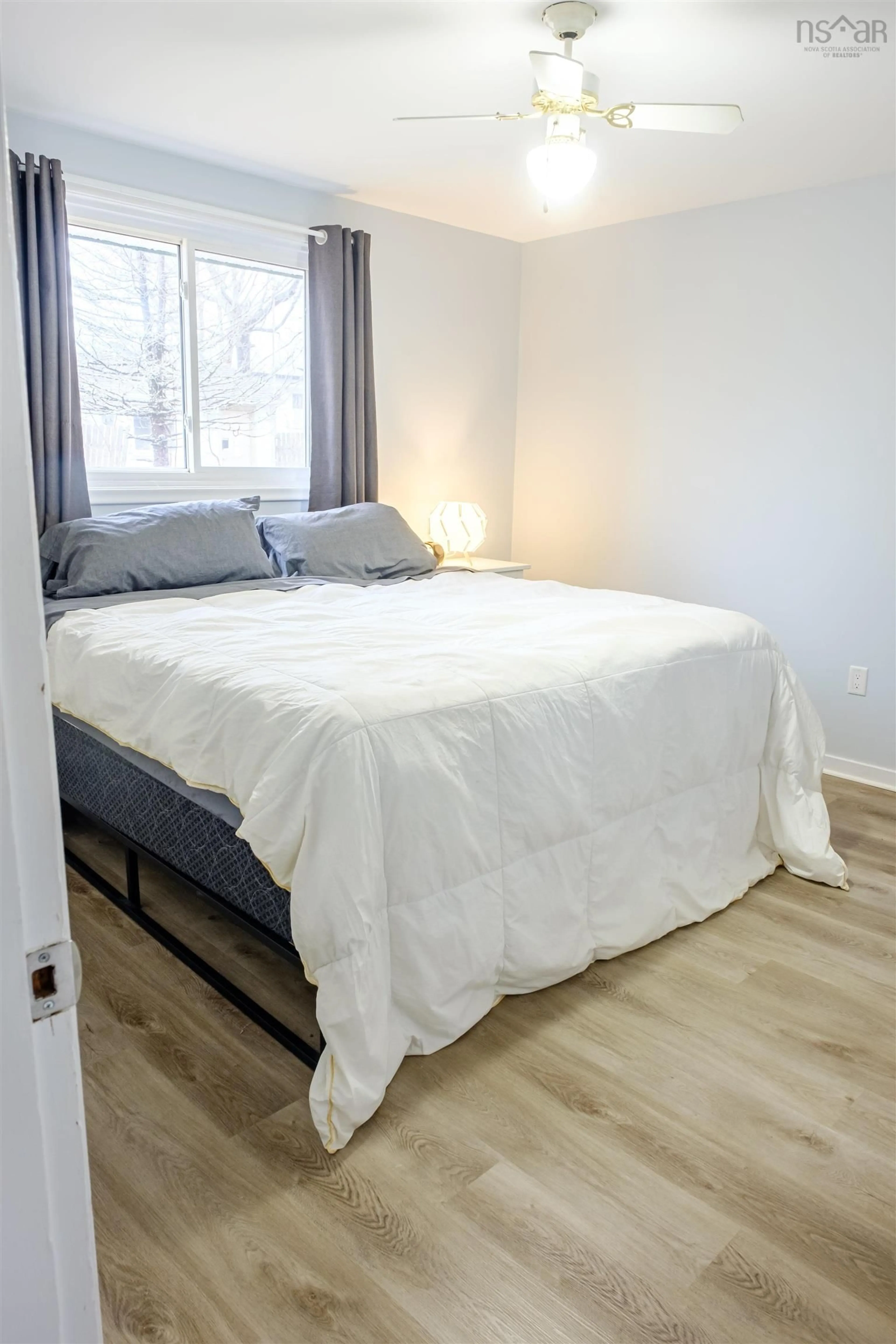 Bedroom with bed, wood/laminate floor for 189 Montague Rd, Lake Loon Nova Scotia B2W 3P6