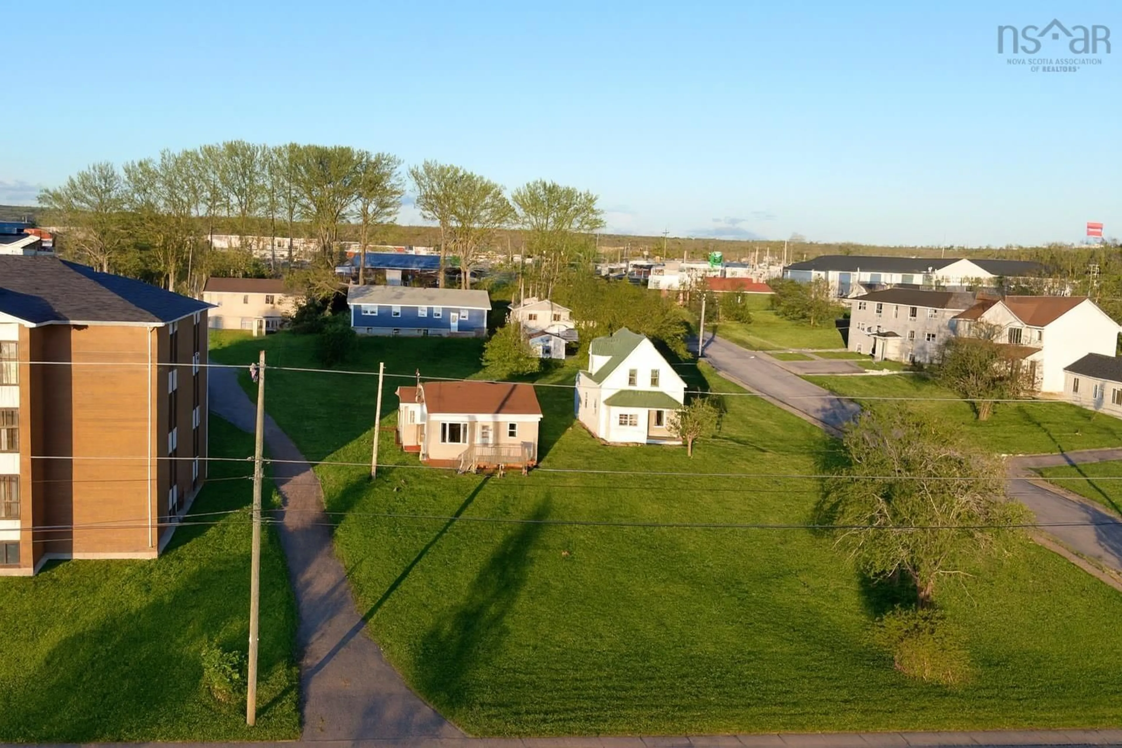 A pic from outside/outdoor area/front of a property/back of a property/a pic from drone, street for 648 Queen St, Port Hawkesbury Nova Scotia B9A 2W5