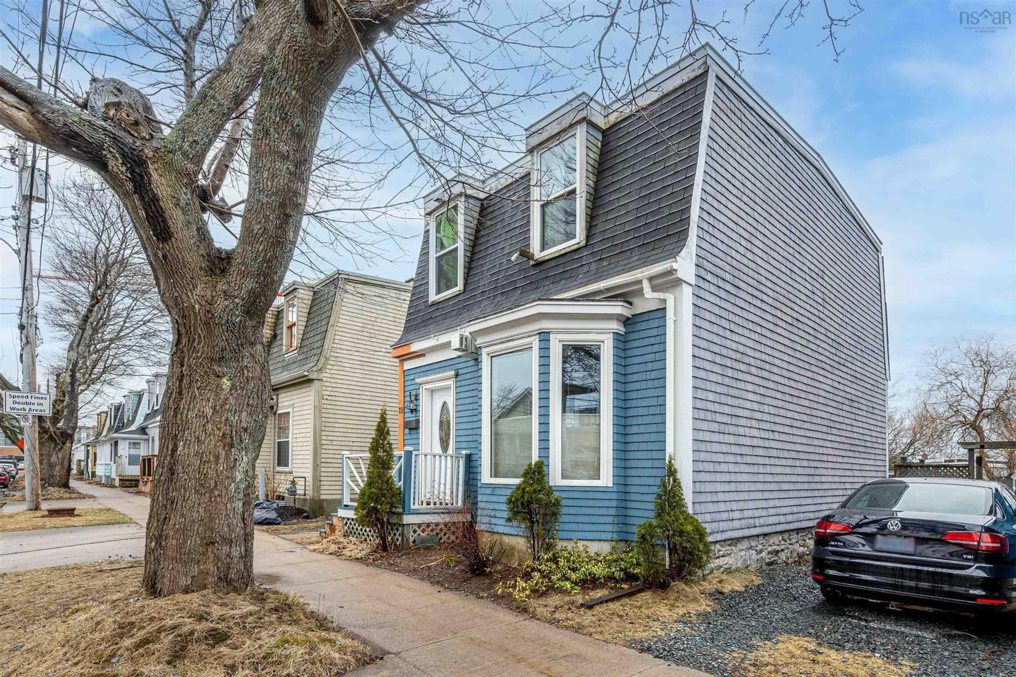 Home with vinyl exterior material, street for 19 George St, Dartmouth Nova Scotia B3A 1L6