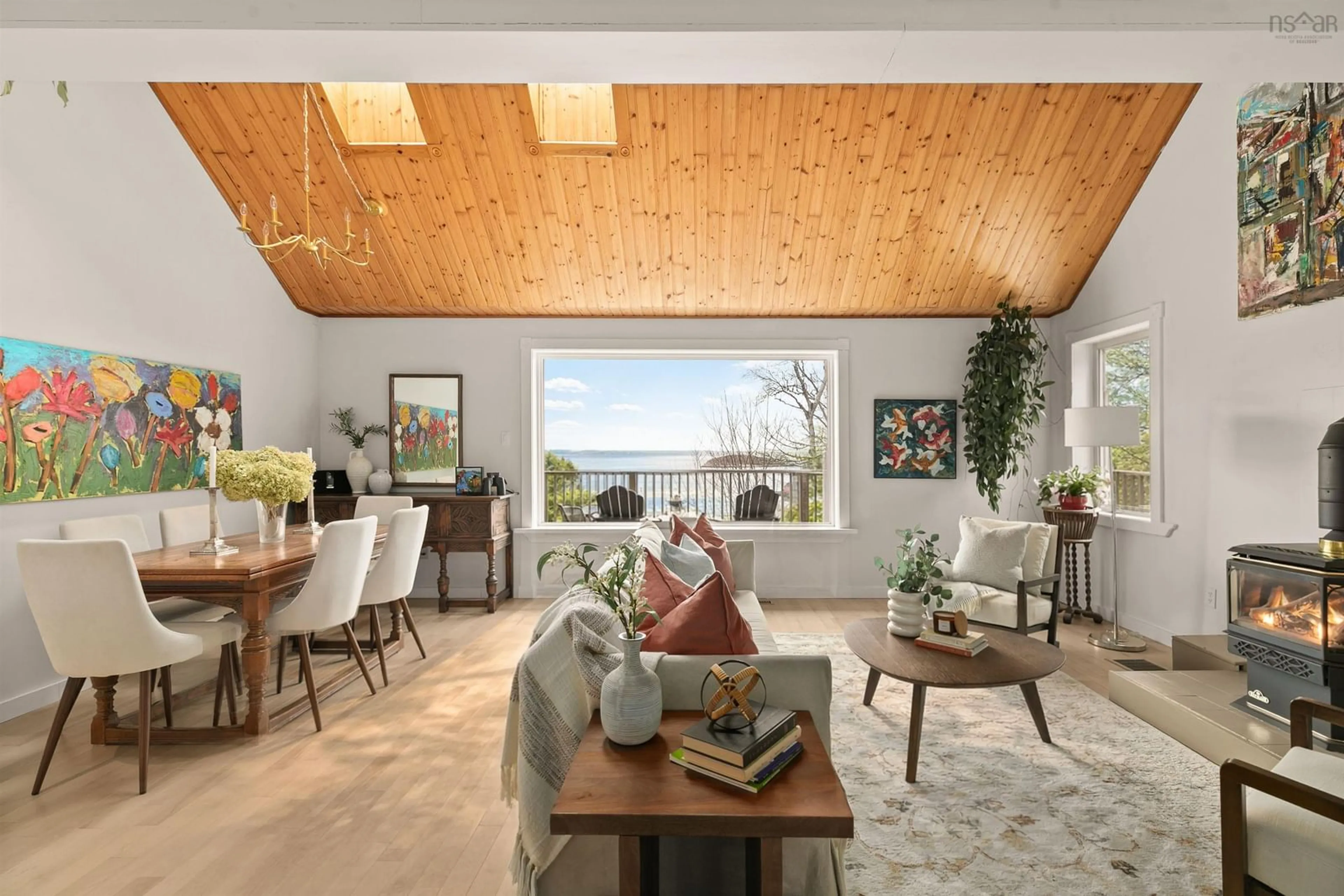 Living room with furniture, wood/laminate floor for 2654 Highway 329, Northwest Cove Nova Scotia B0J 1T0