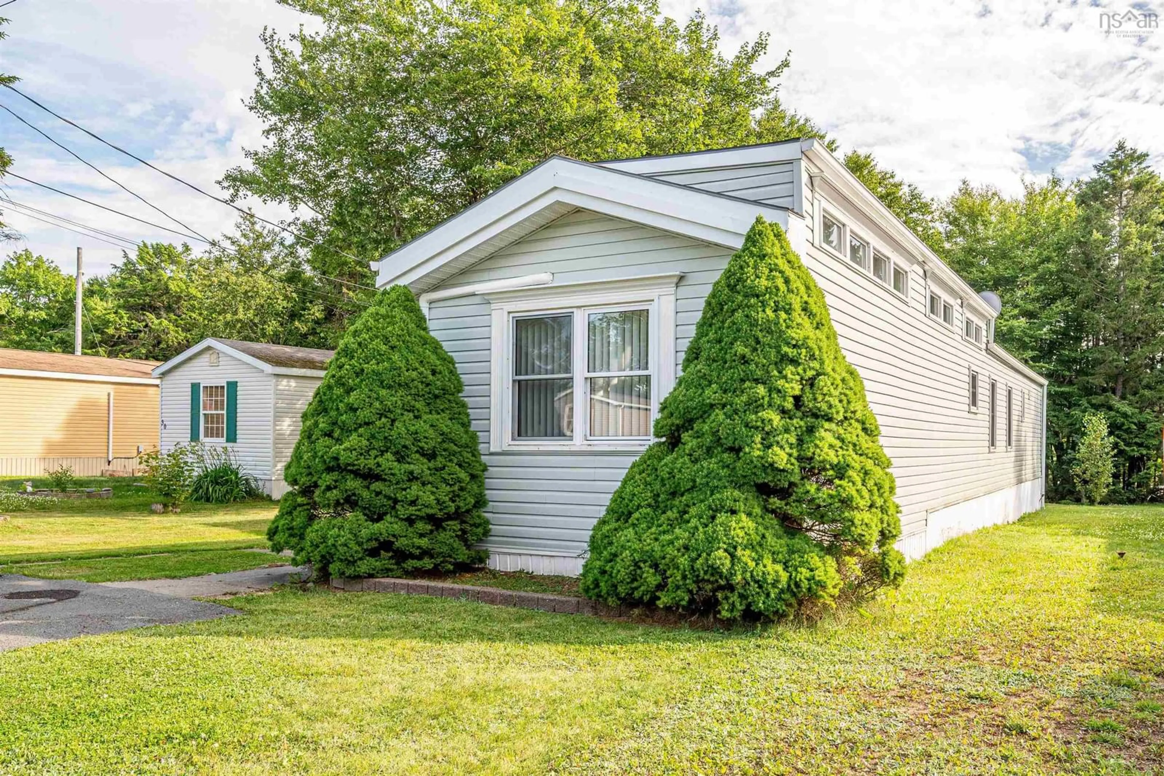 Home with vinyl exterior material, street for 32 Champlain Ave, Middle Sackville Nova Scotia B4E 3B2