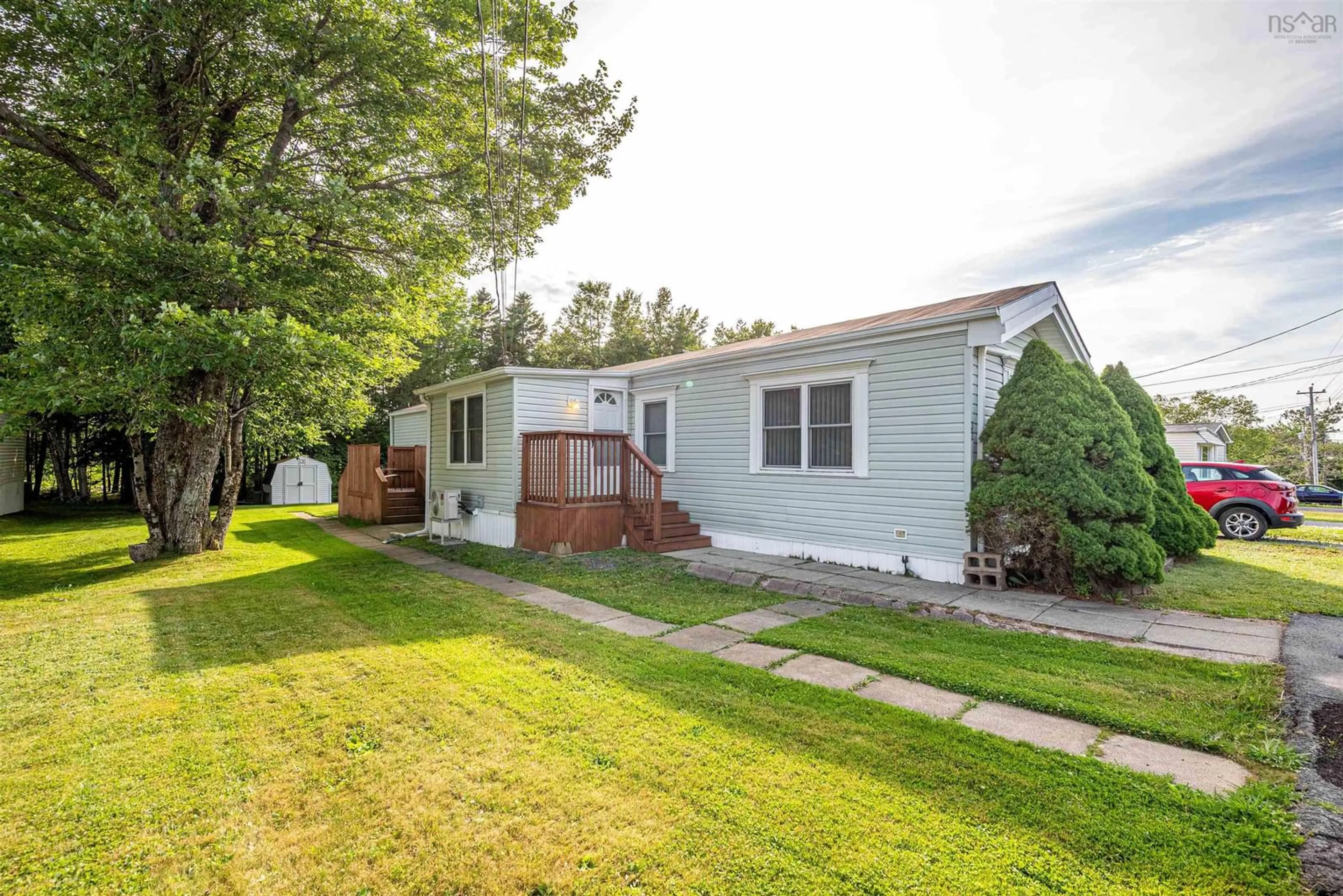 Home with vinyl exterior material, street for 32 Champlain Ave, Middle Sackville Nova Scotia B4E 3B2