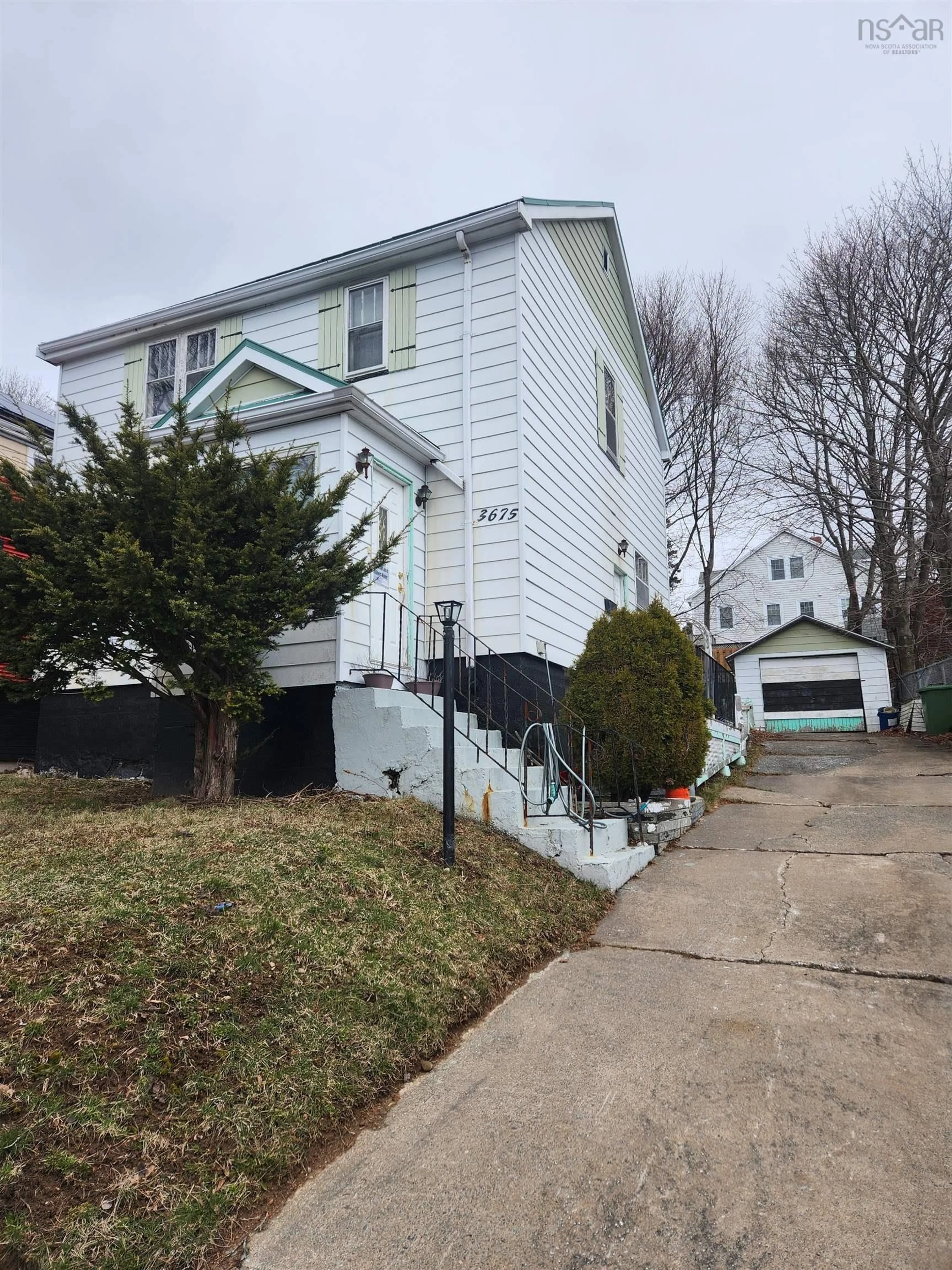 Home with vinyl exterior material, street for 3675 Memorial Dr, Halifax Nova Scotia B3K 5A3