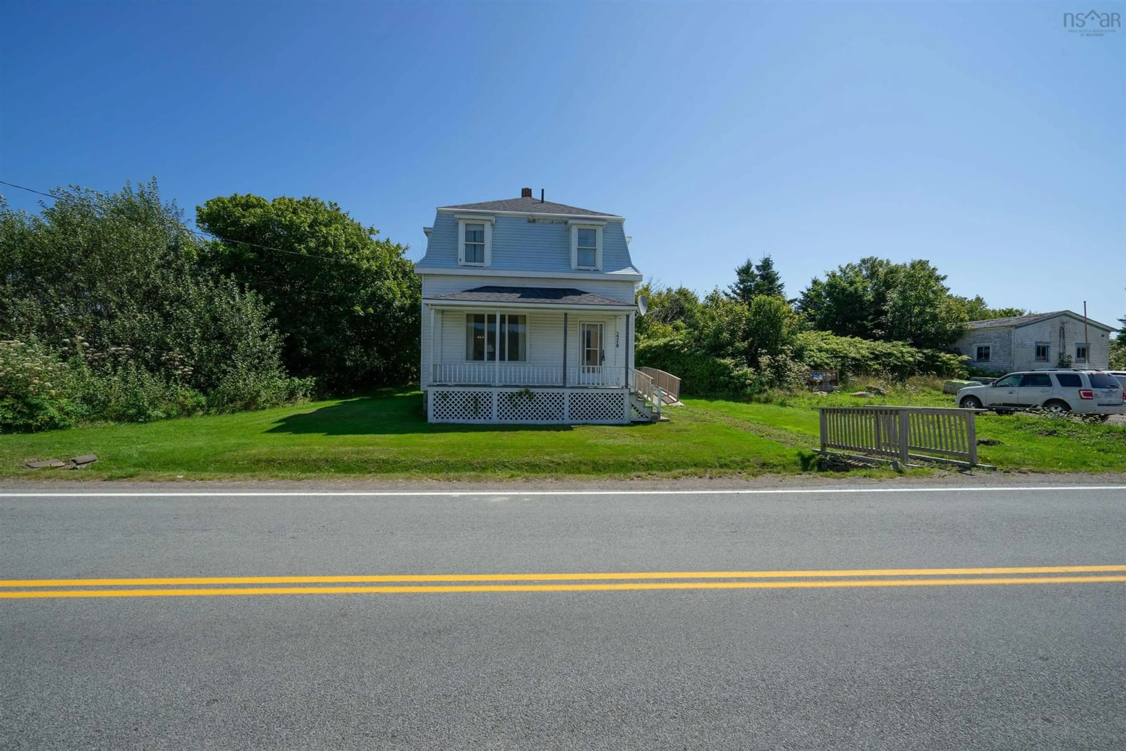 A pic from outside/outdoor area/front of a property/back of a property/a pic from drone, street for 3248 Highway 217, Tiverton Nova Scotia B0V 1G0