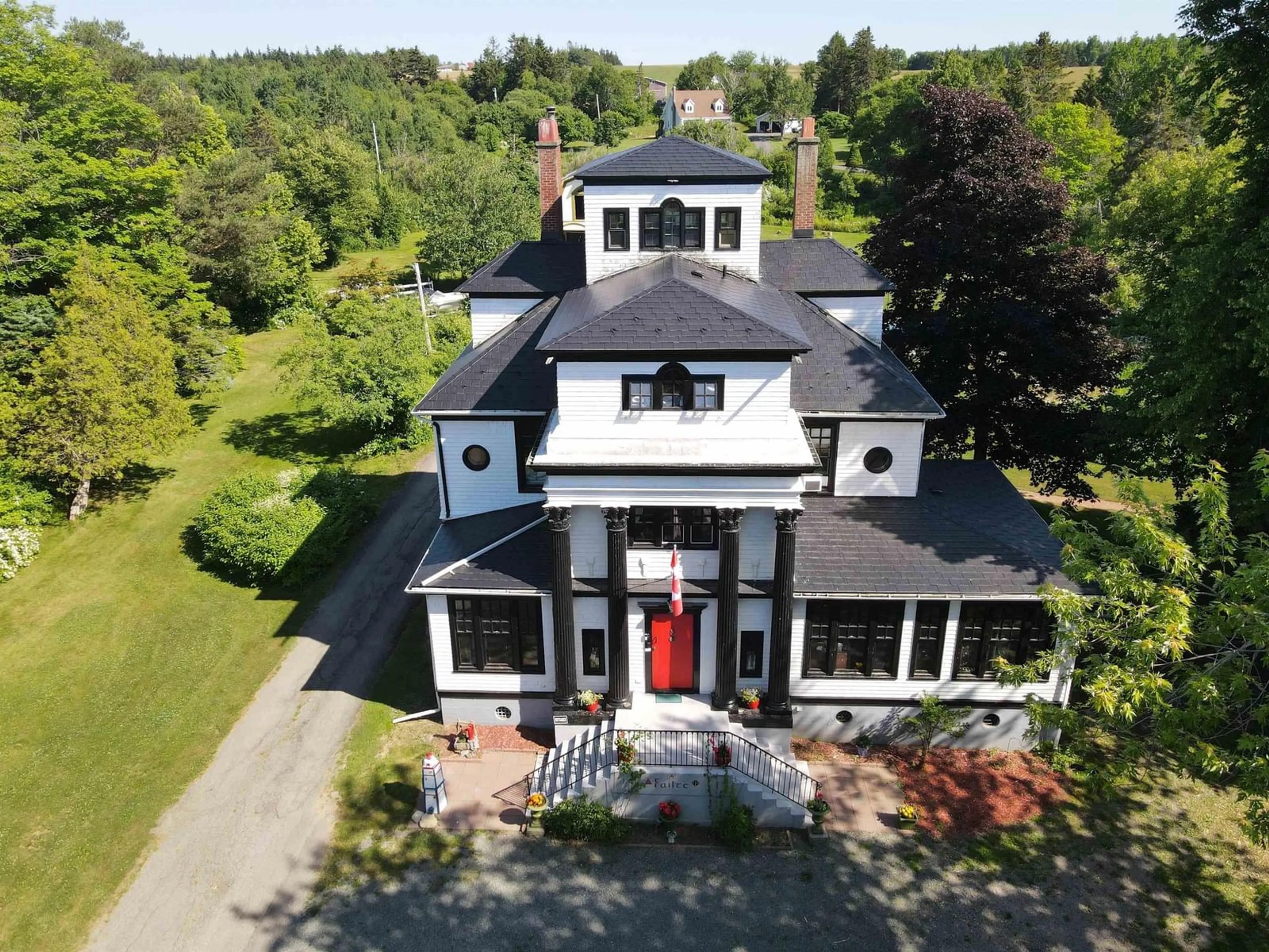 A pic from outside/outdoor area/front of a property/back of a property/a pic from drone, building for 317 Church Rd, Little Bras D'Or Nova Scotia B0E 3A3