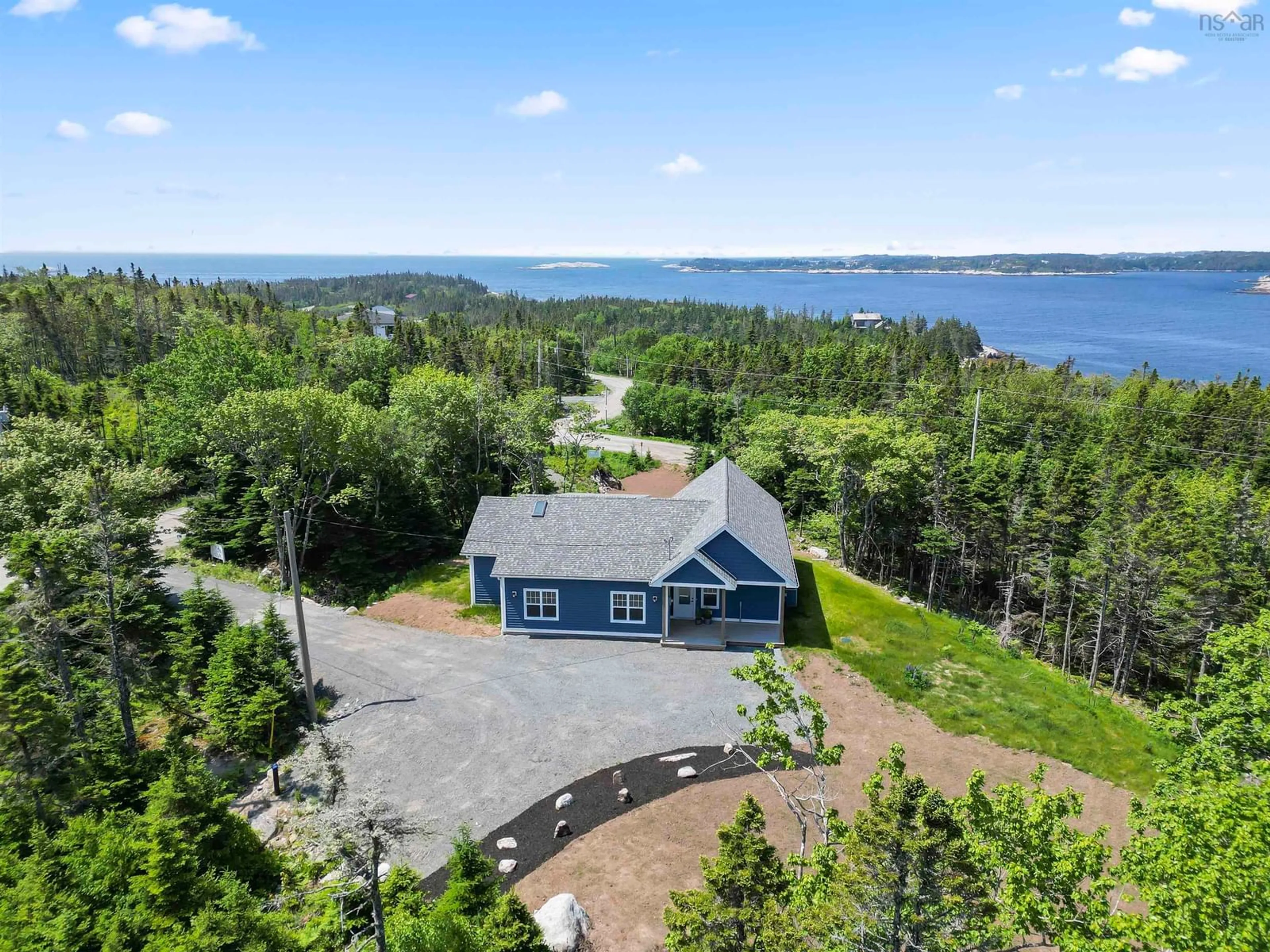 A pic from outside/outdoor area/front of a property/back of a property/a pic from drone, water/lake/river/ocean view for 667 Shad Point Pky, Blind Bay Nova Scotia B3Z 4C1