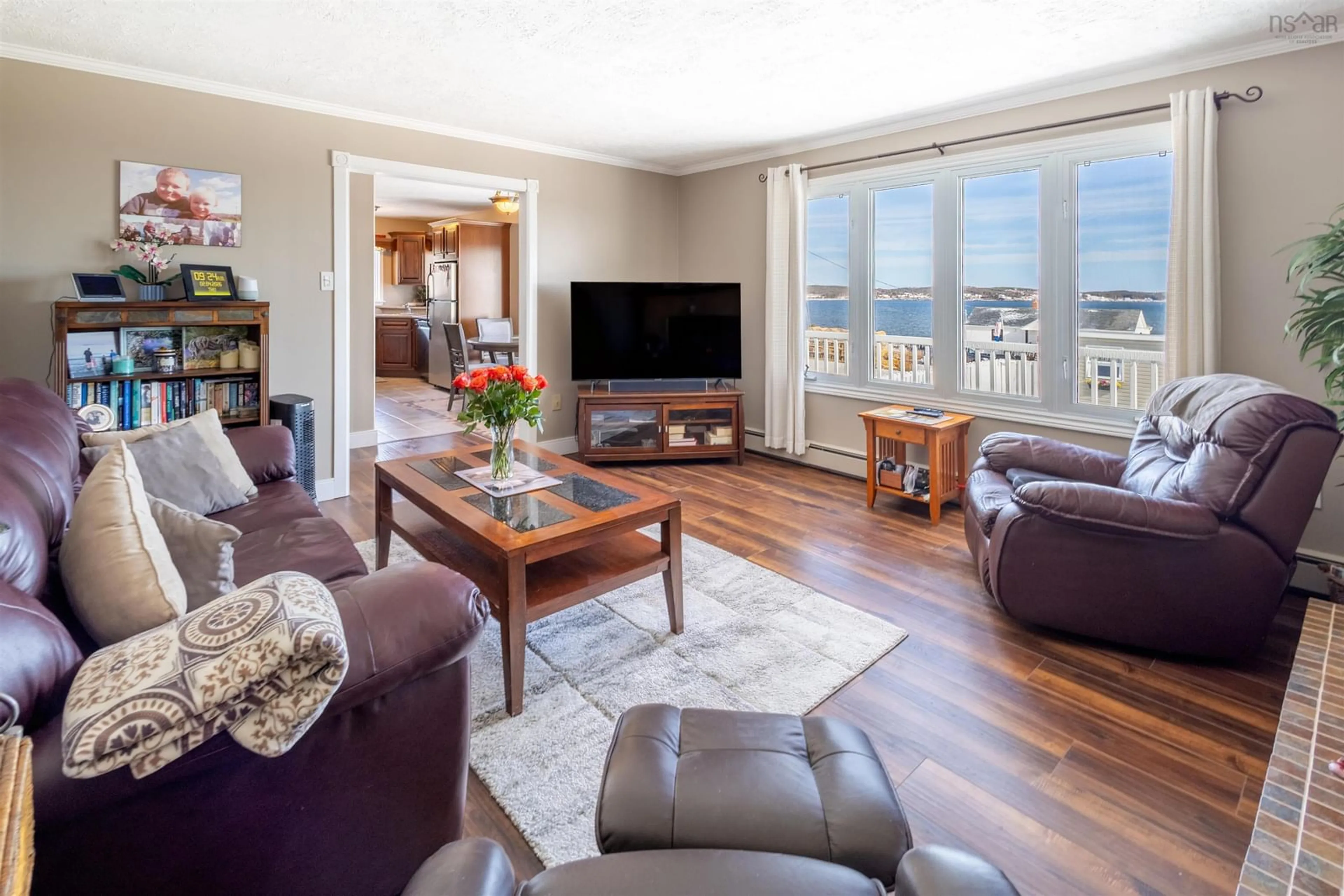 Living room with furniture, wood/laminate floor for 16 Seaview Lane, Main-À-Dieu Nova Scotia B1C 1Z2
