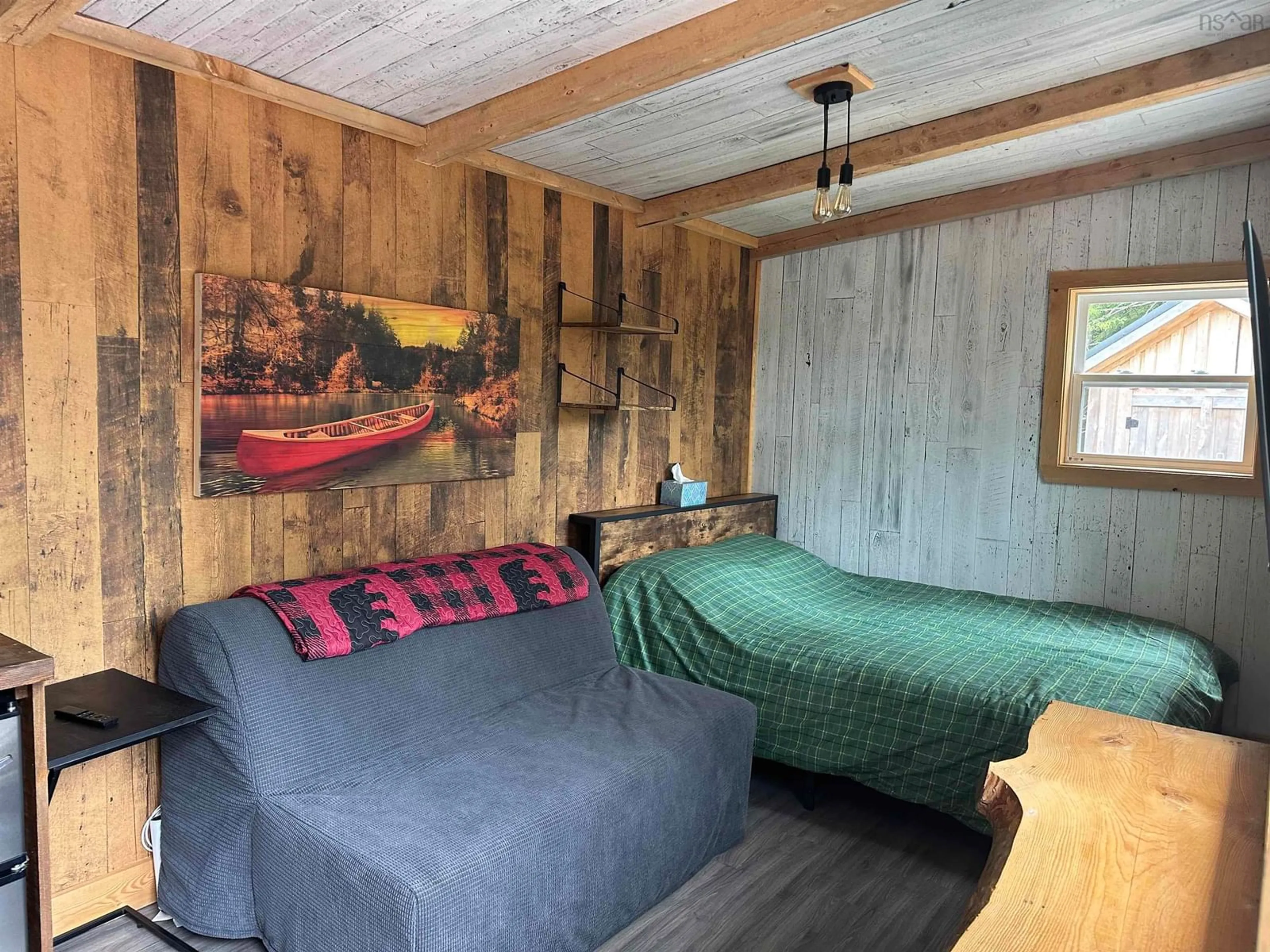 Bedroom with bed, wood/laminate floor for 223 New Ross Road, Leminster Nova Scotia B0N 2T0