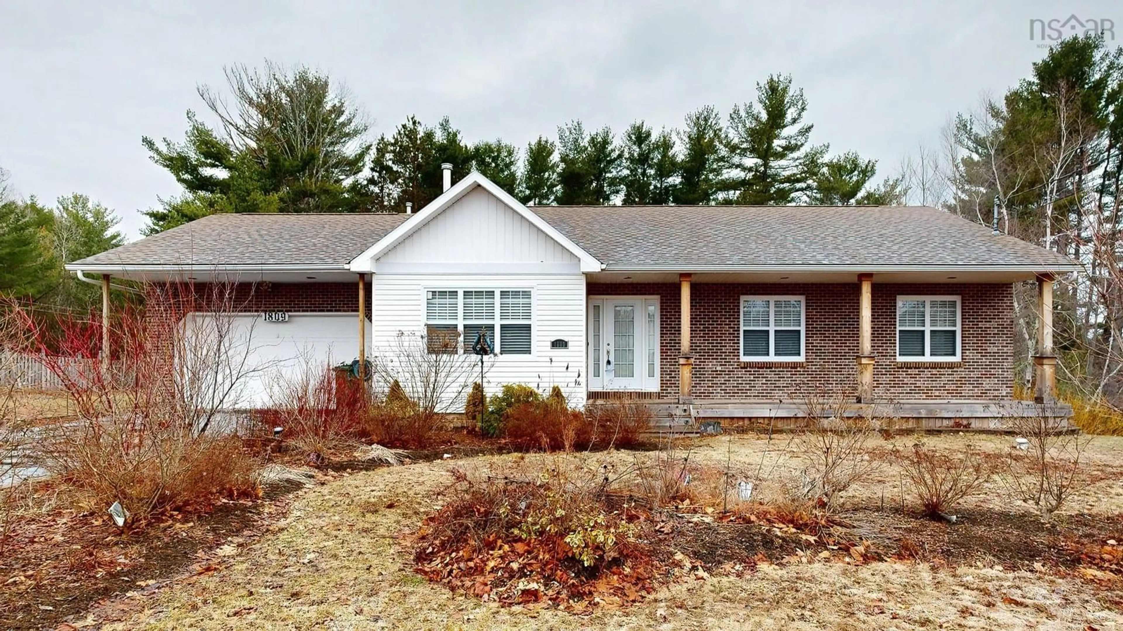 Home with vinyl exterior material, street for 1809 Acadia St, Kingston Nova Scotia B0P 1R0