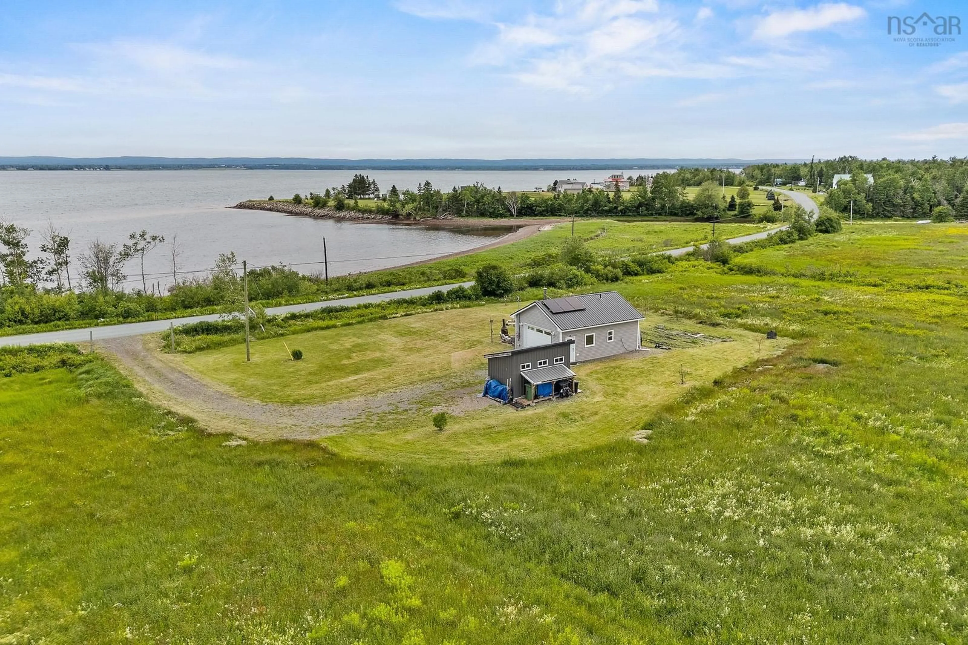 A pic from outside/outdoor area/front of a property/back of a property/a pic from drone, water/lake/river/ocean view for 3667 Malagash Rd, Malagash Centre Nova Scotia B0K 1E0