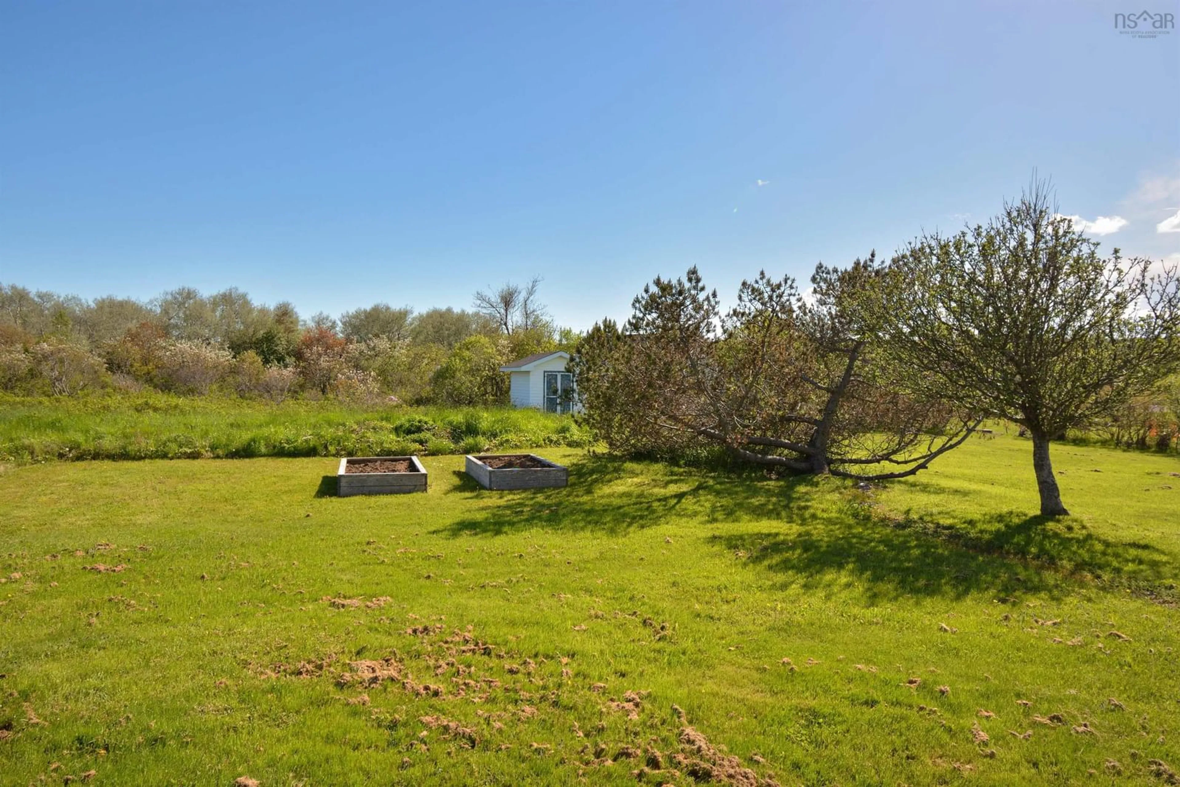 A pic from outside/outdoor area/front of a property/back of a property/a pic from drone, forest/trees view for 16 Karl's Lane, Glace Bay Nova Scotia B1A 6Y7