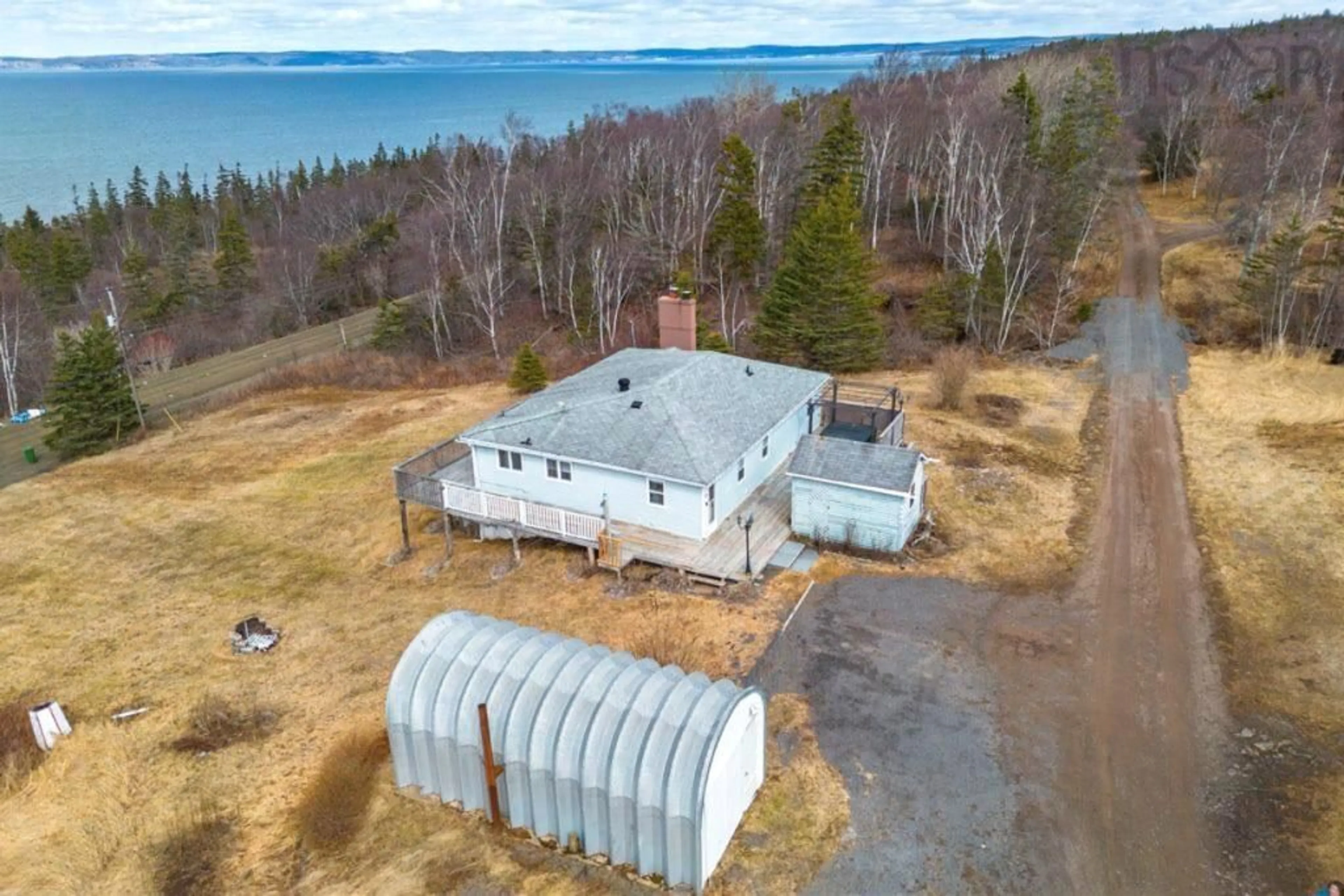 A pic from outside/outdoor area/front of a property/back of a property/a pic from drone, water/lake/river/ocean view for 354 Old Baxter Mill Rd, Baxters Harbour Nova Scotia B0P 1H0