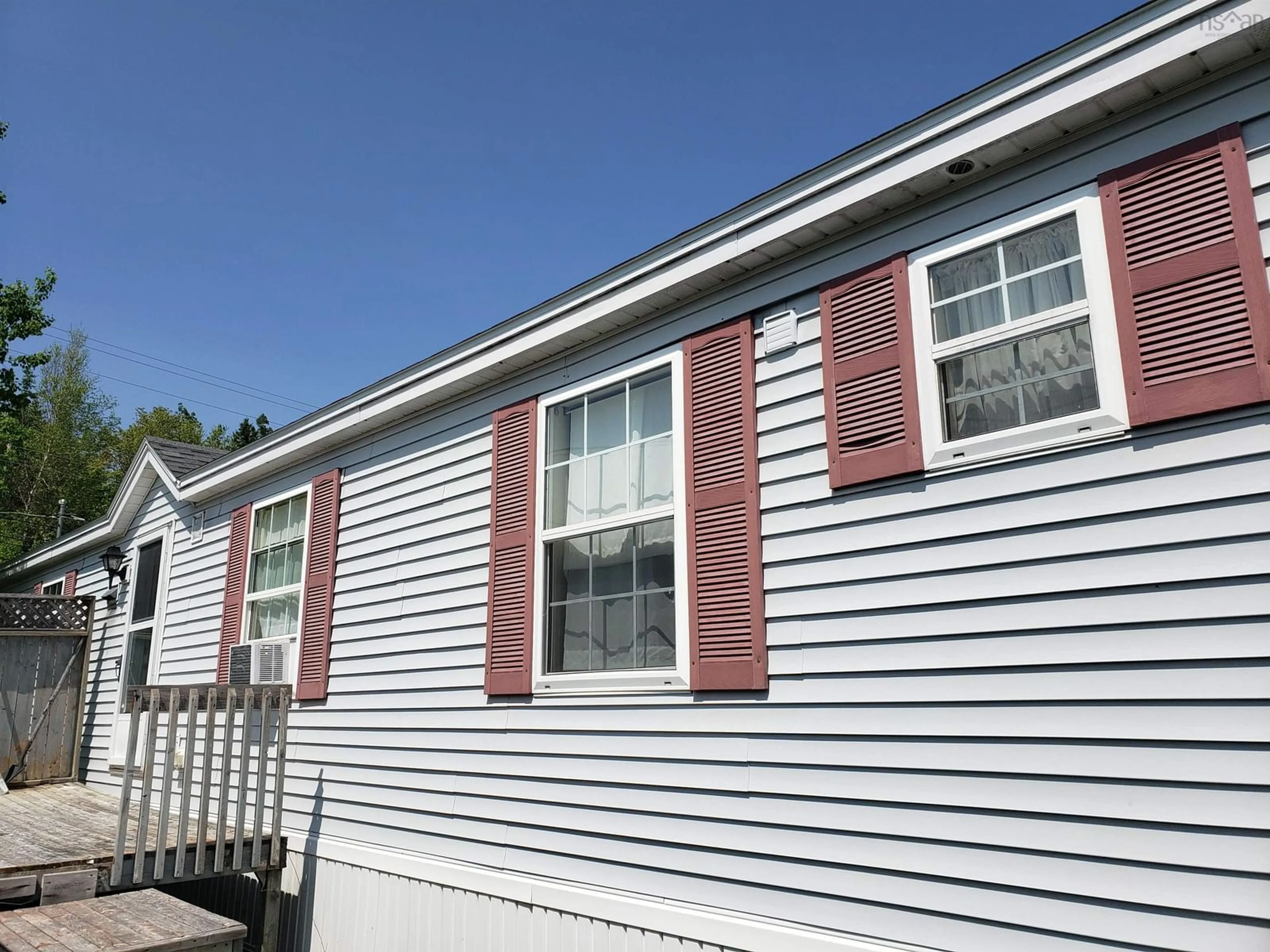 Home with vinyl exterior material, street for 21 Parkwood, North Grant Nova Scotia B2G 2L1