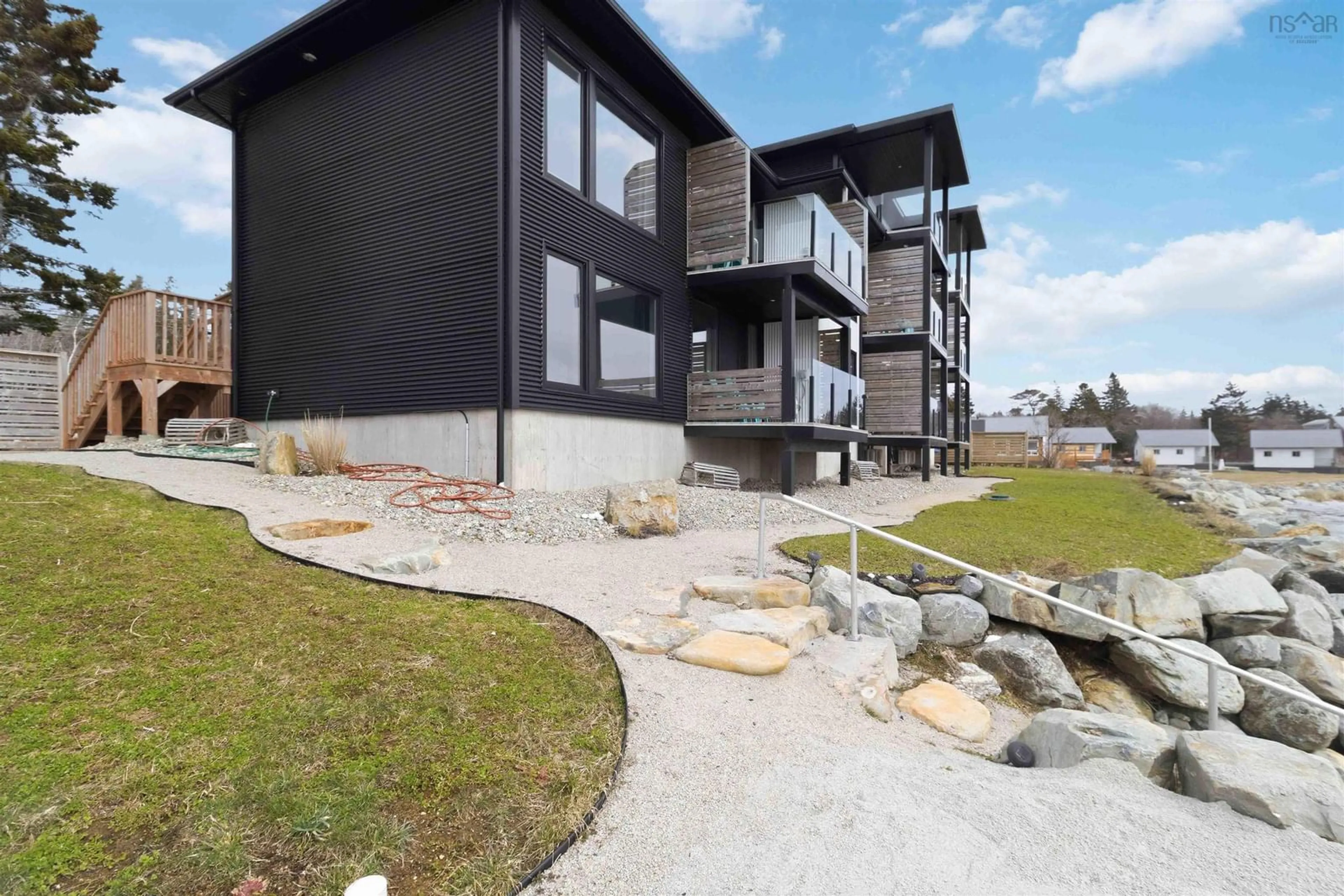 A pic from outside/outdoor area/front of a property/back of a property/a pic from drone, unknown for 6755 Highway 3 #3, Hunt's Point Nova Scotia B0T 1G0