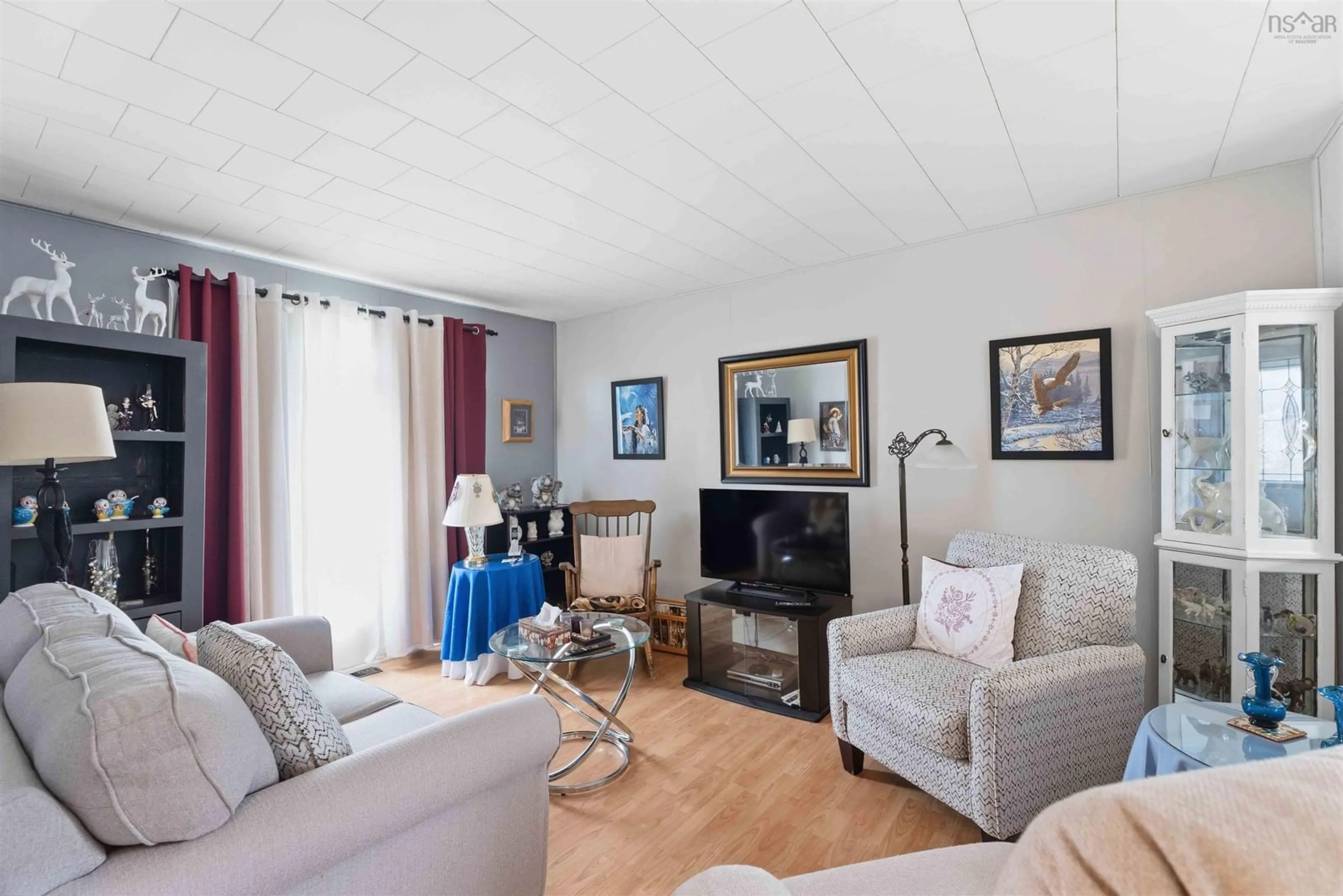 Living room with furniture, wood/laminate floor for 3 Inglewood Ave, Kentville Nova Scotia B4N 1V4