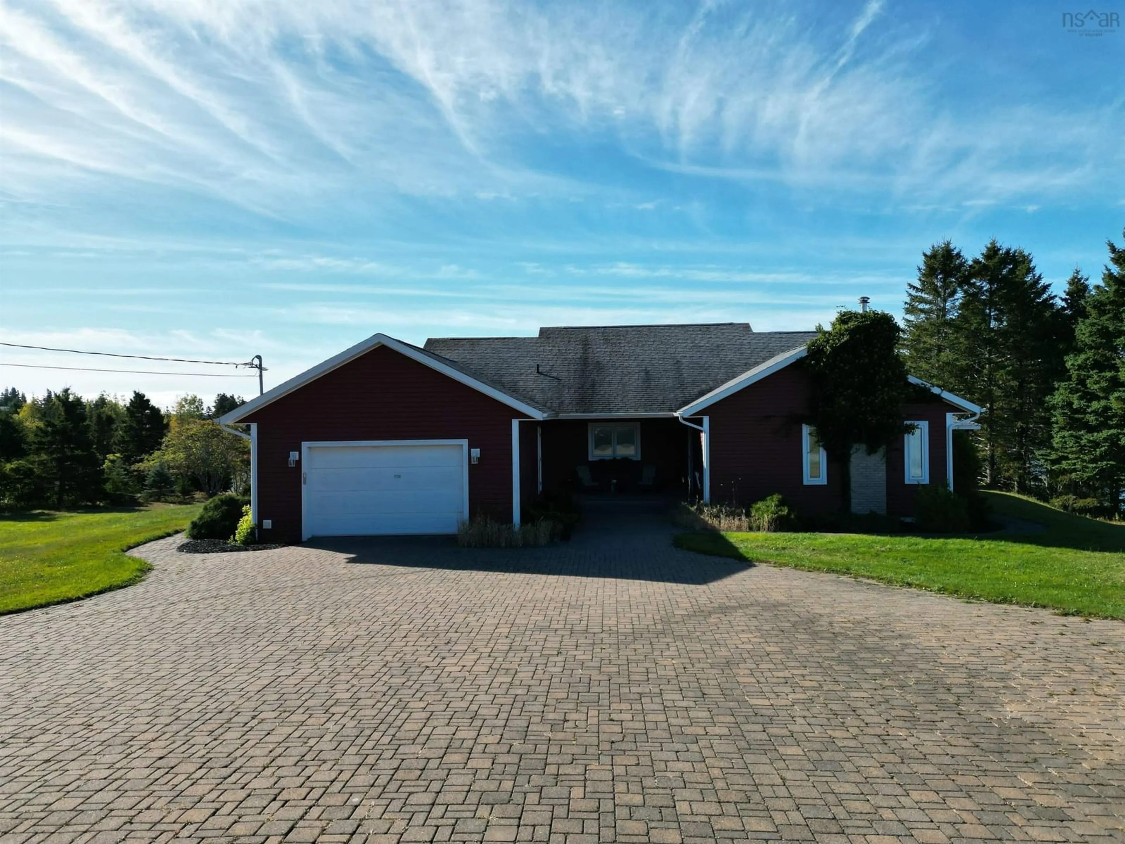 A pic from outside/outdoor area/front of a property/back of a property/a pic from drone, street for 11 Wharf Rd, River Bourgeois Nova Scotia B0E 2X0