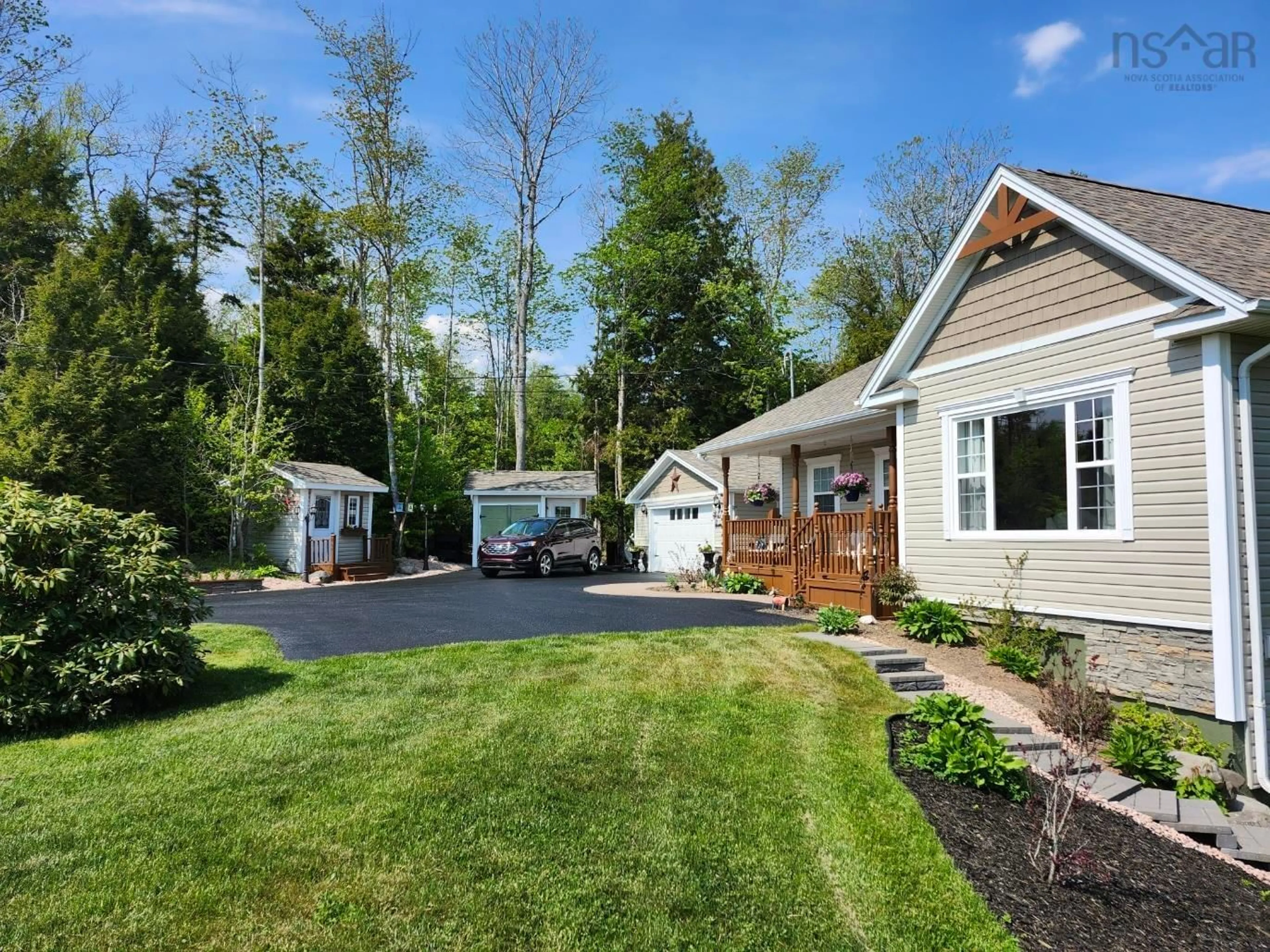 Home with vinyl exterior material, street for 377 Laurel Ridge Dr, Beaver Bank Nova Scotia B4G 1H7