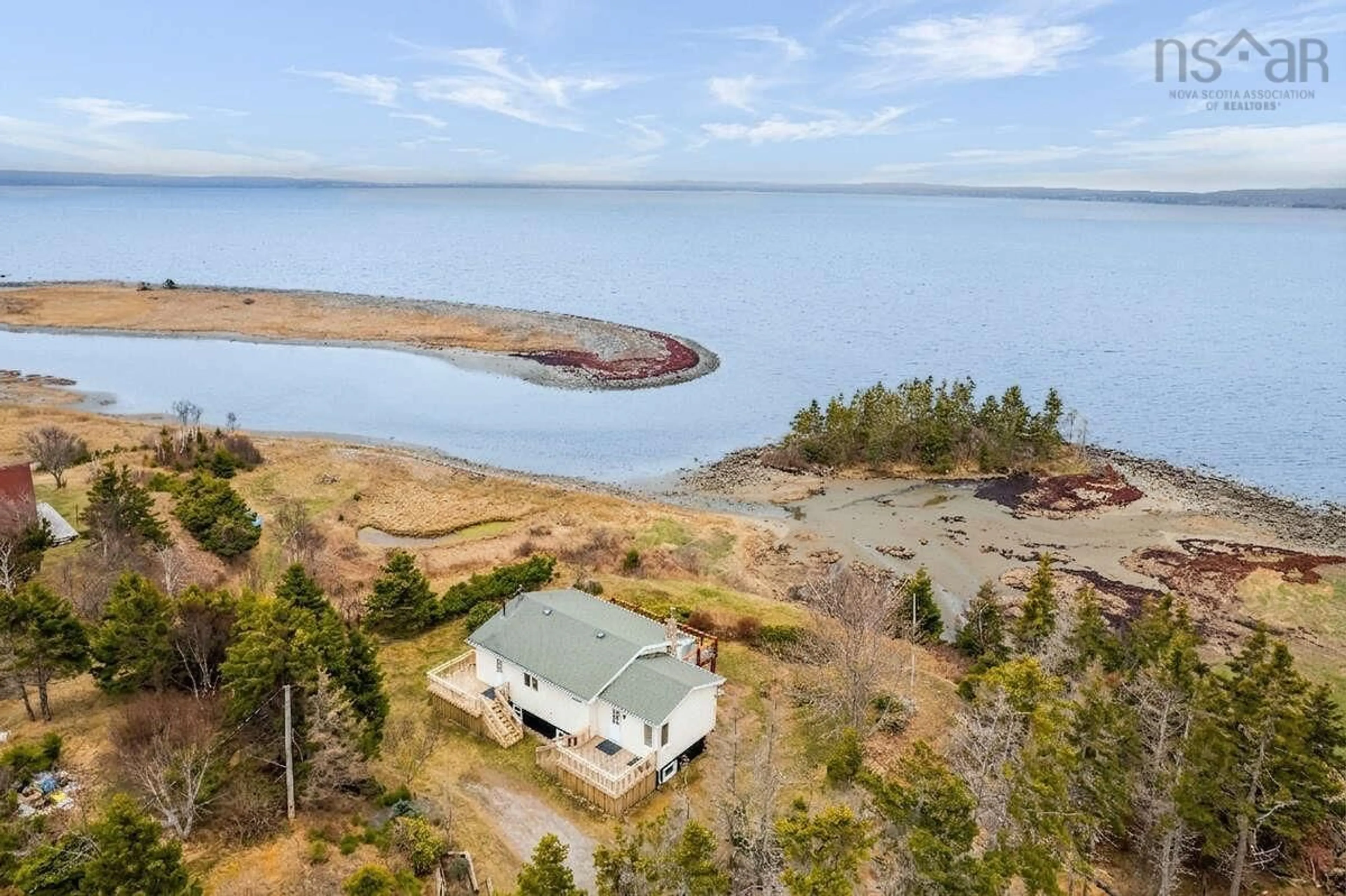A pic from outside/outdoor area/front of a property/back of a property/a pic from drone, water/lake/river/ocean view for 130 Scottsdale Lane, Round Island Nova Scotia B1B 1P7