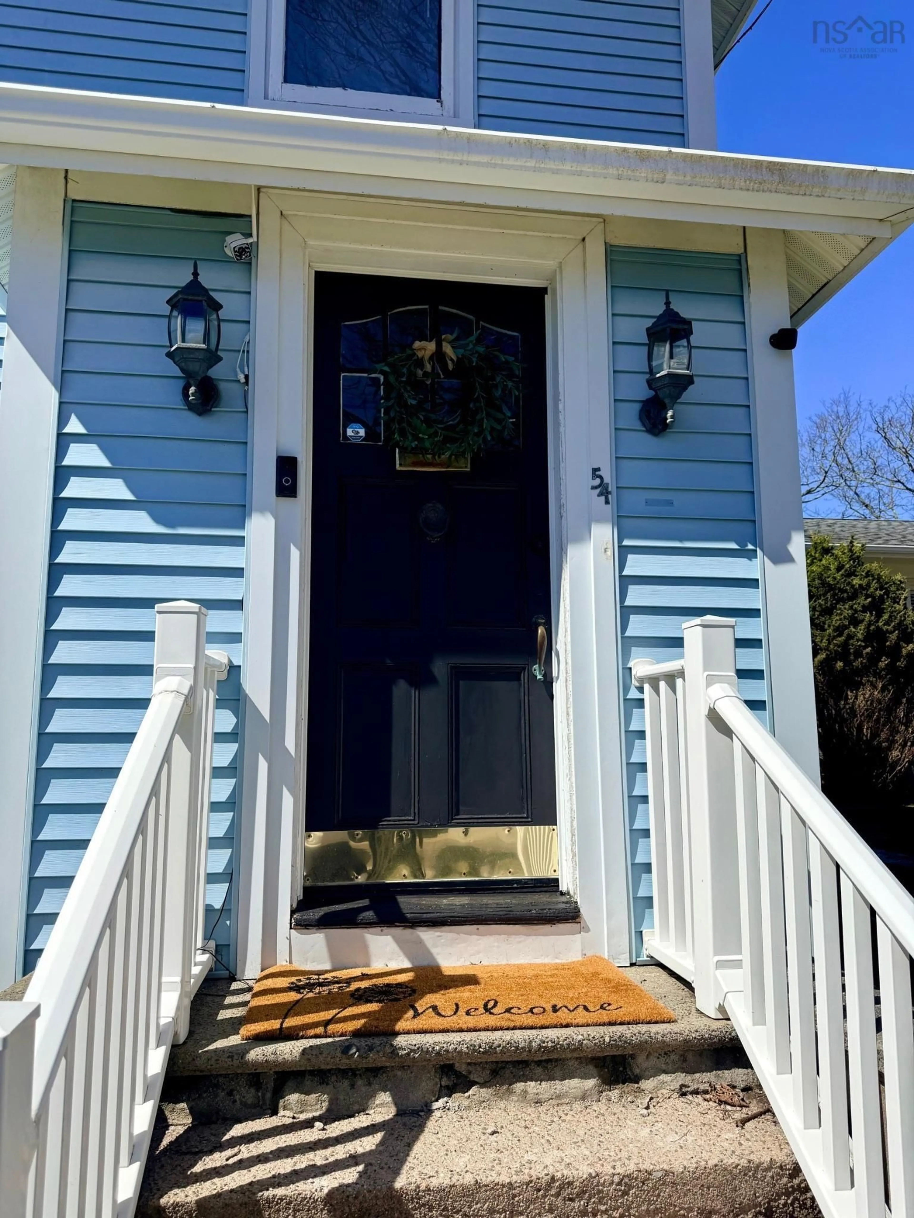 Home with vinyl exterior material, street for 54 William St, Yarmouth Nova Scotia B5A 1Y5