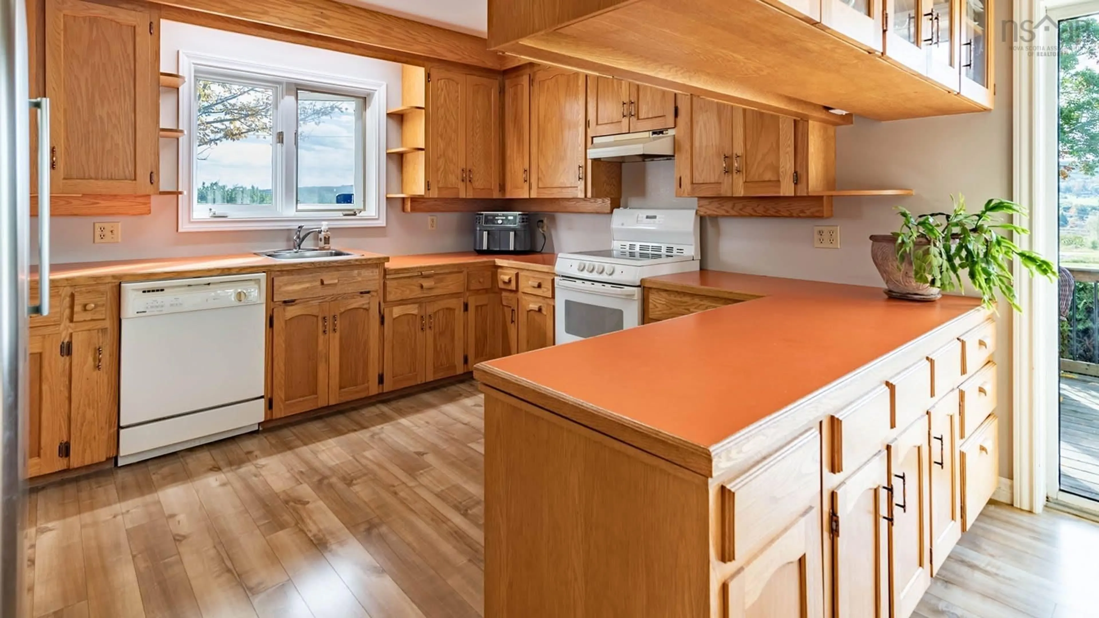 Standard kitchen, wood/laminate floor for 1773 Grand Pre Rd Rd, Melanson Nova Scotia B0P 1M0