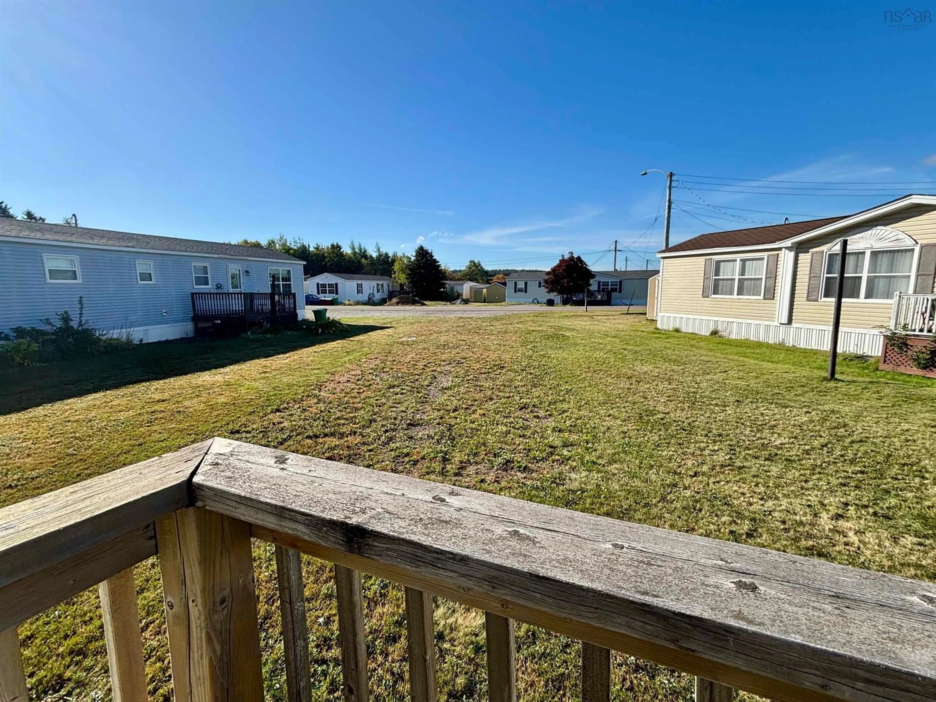 A pic from outside/outdoor area/front of a property/back of a property/a pic from drone, water/lake/river/ocean view for 14 Chisholm Crt, Port Hawkesbury Nova Scotia B9A 3M2