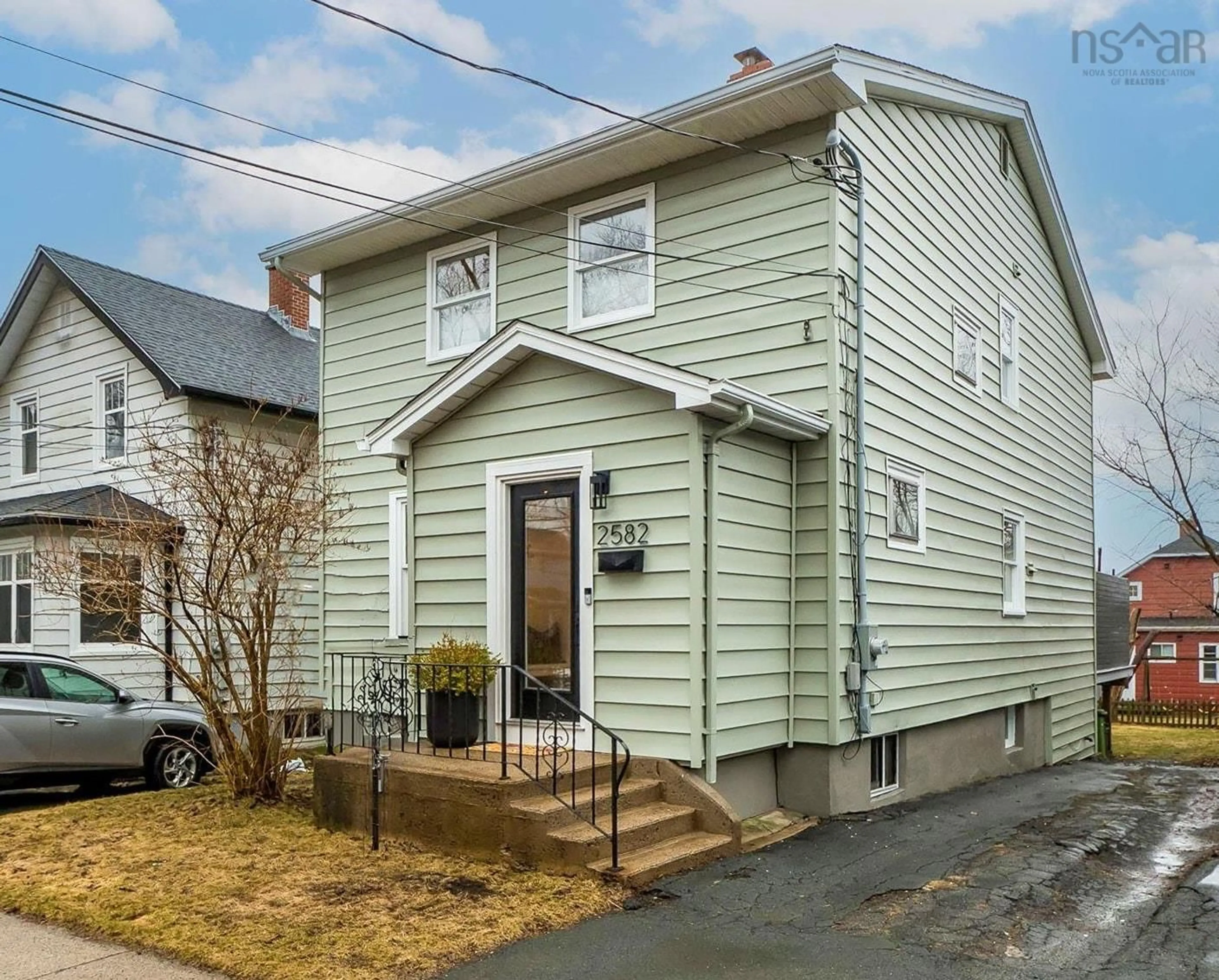 Home with vinyl exterior material, street for 2582 Elm St, Halifax Nova Scotia B3L 2Y4