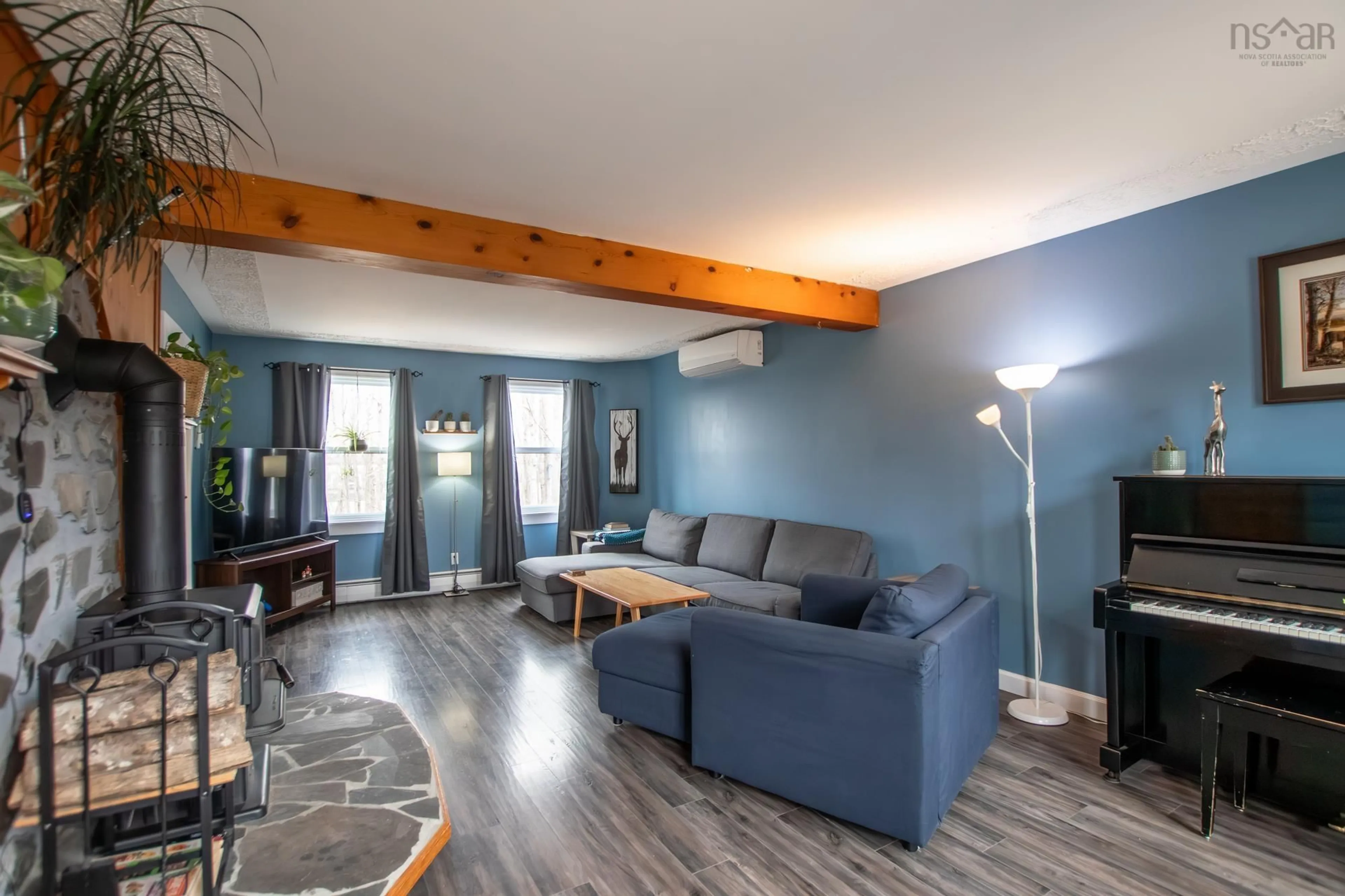 Living room with furniture, wood/laminate floor for 169 Quaker Cres, Lower Sackville Nova Scotia B4C 2Z3