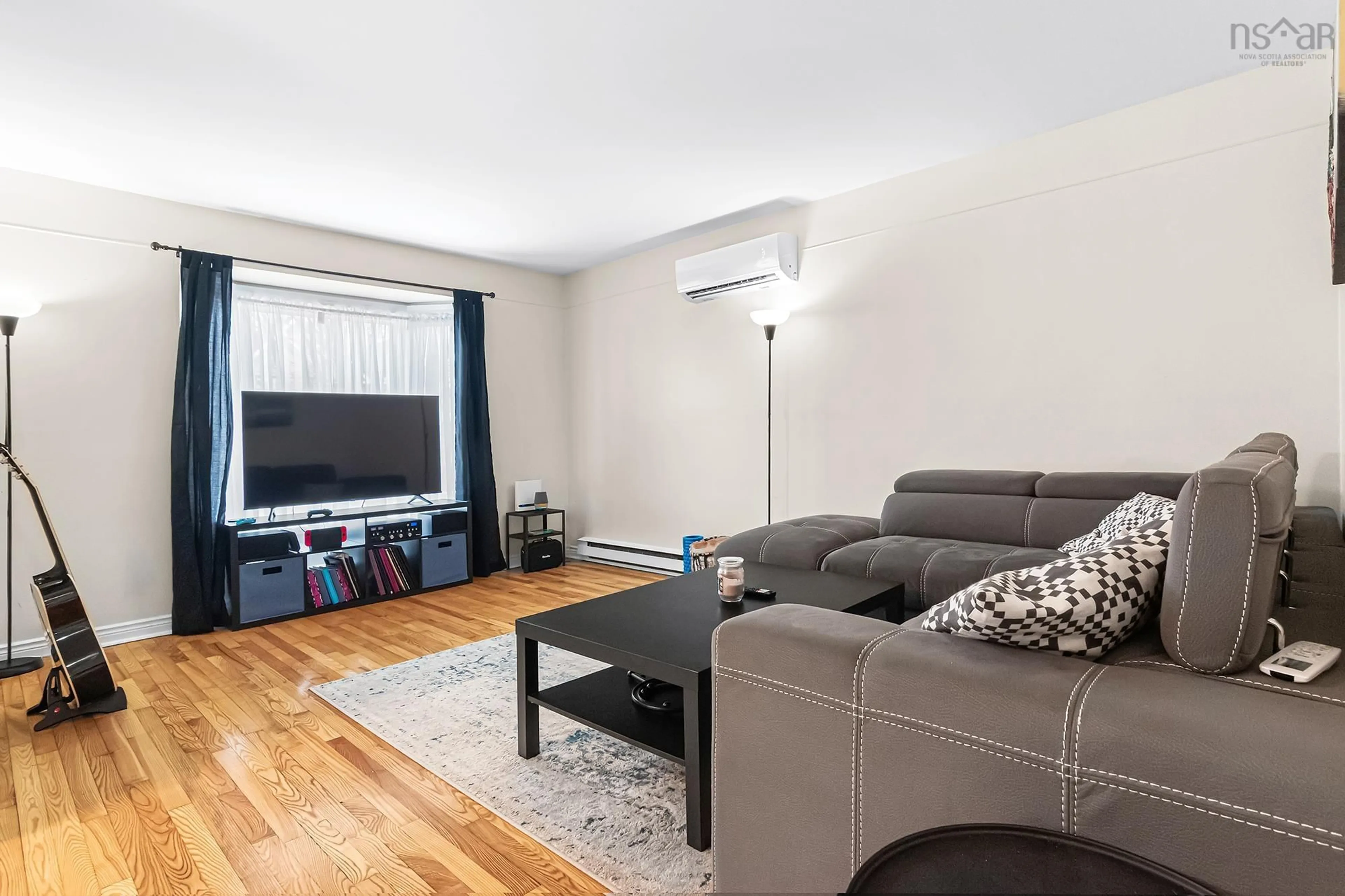 Living room with furniture, wood/laminate floor for 163 Silistria Dr, Dartmouth Nova Scotia B2W 6B1