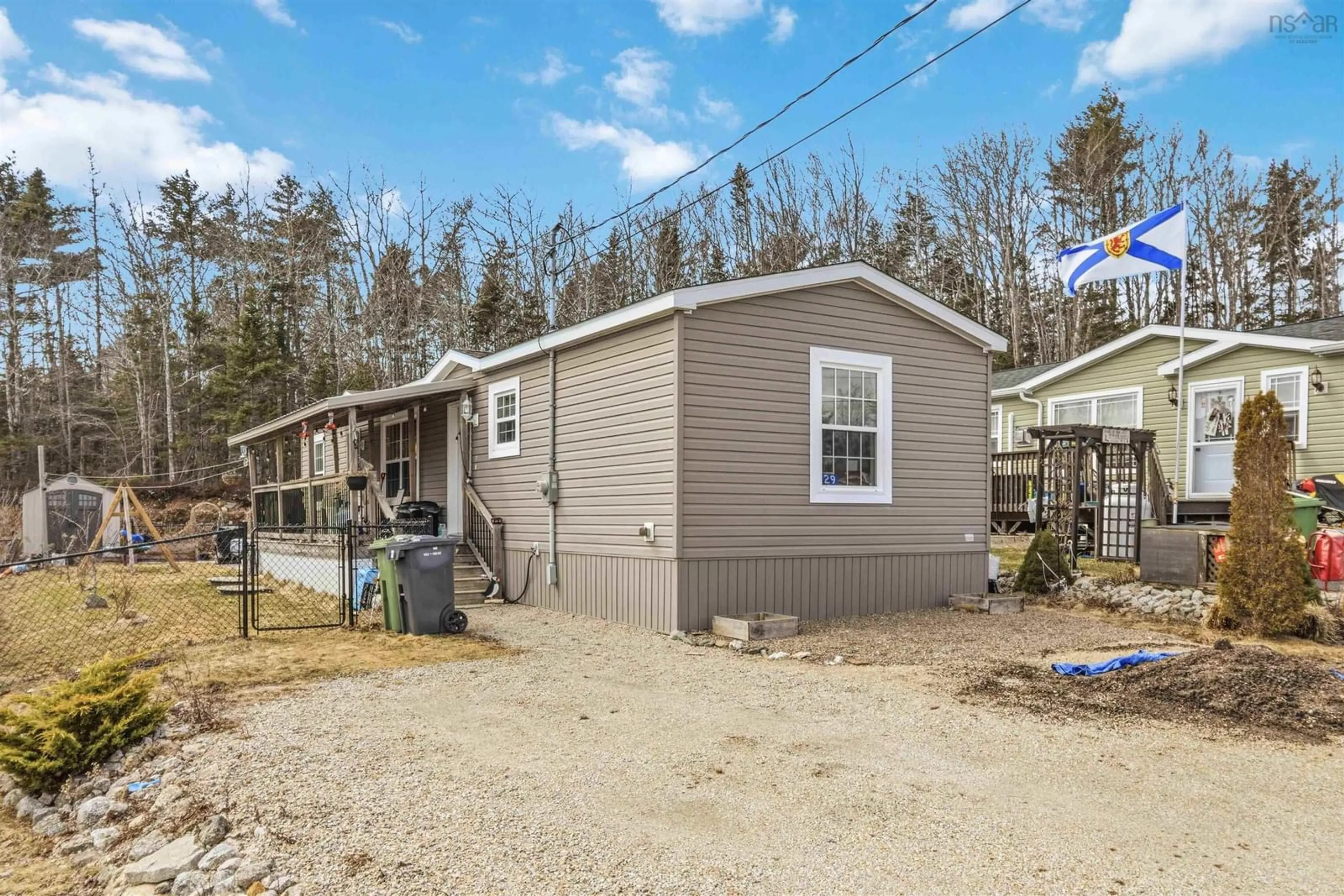 Home with vinyl exterior material, street for 29 Sea Glass Dr, Simms Settlement Nova Scotia B0J 1T0