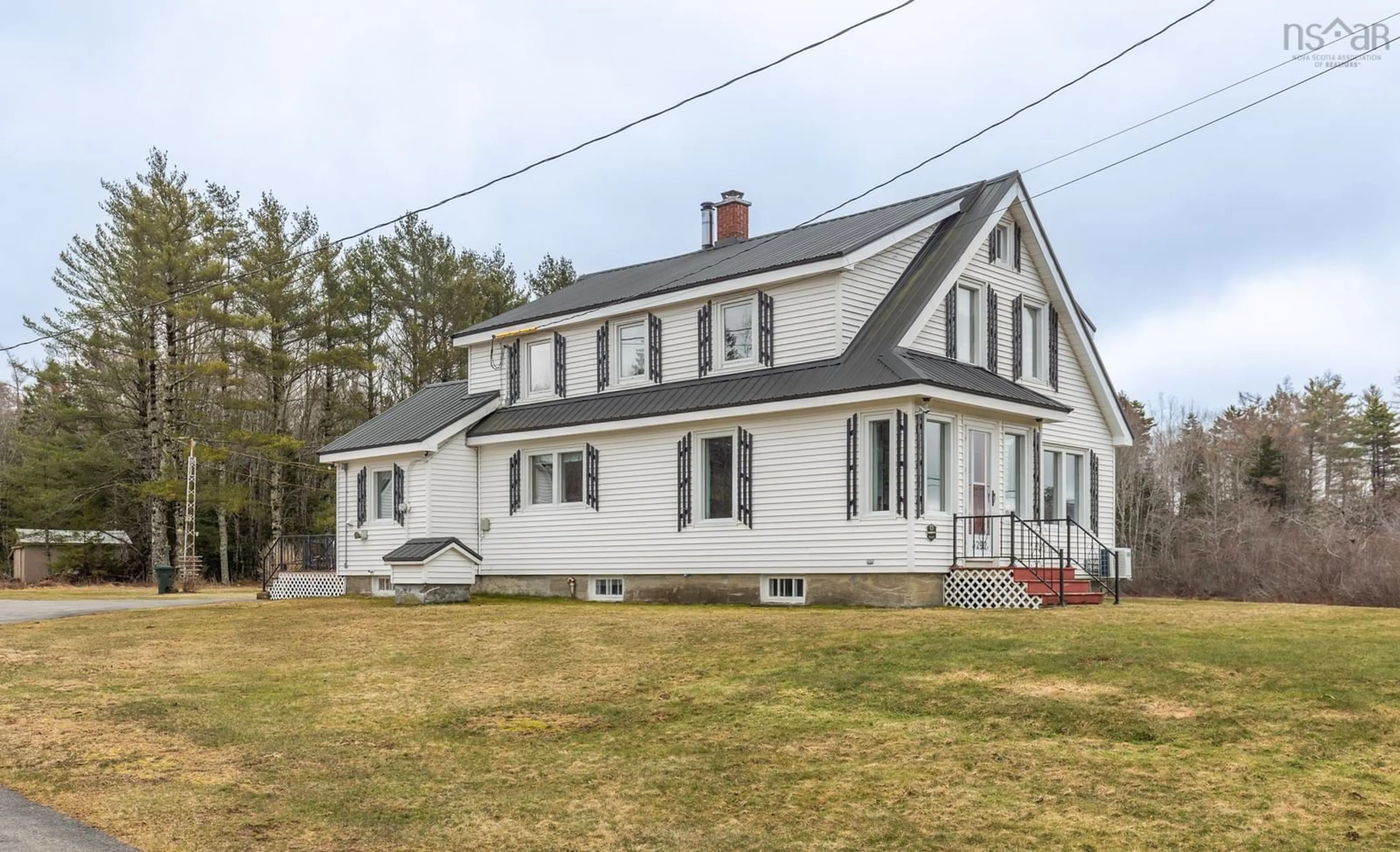 Home with vinyl exterior material, street for 3292 Highway 340, Corberrie Nova Scotia B0W 3T0