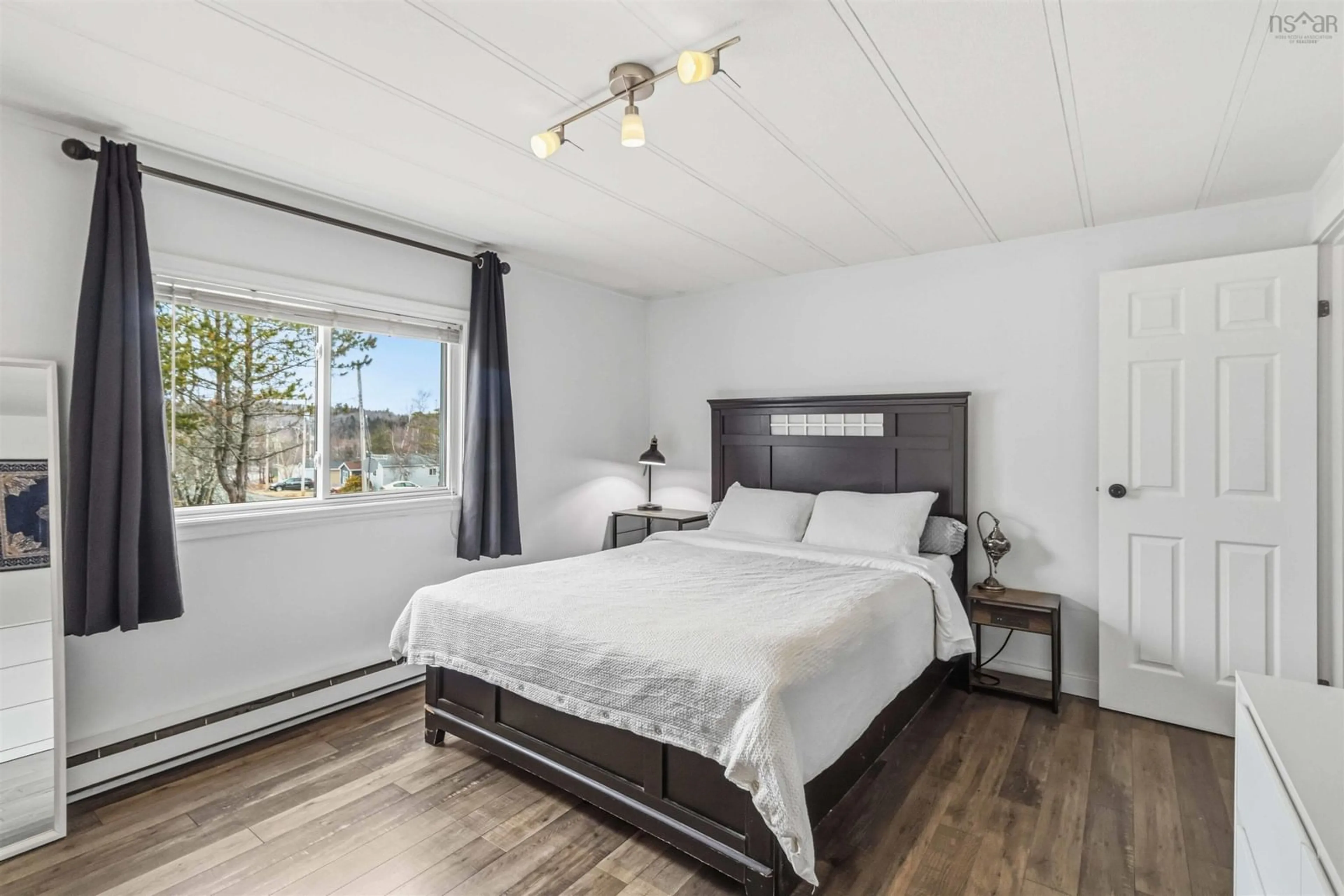 Bedroom with bed, wood/laminate floor for 34 Hughes Dr, Middle Sackville Nova Scotia B4E 2Y2
