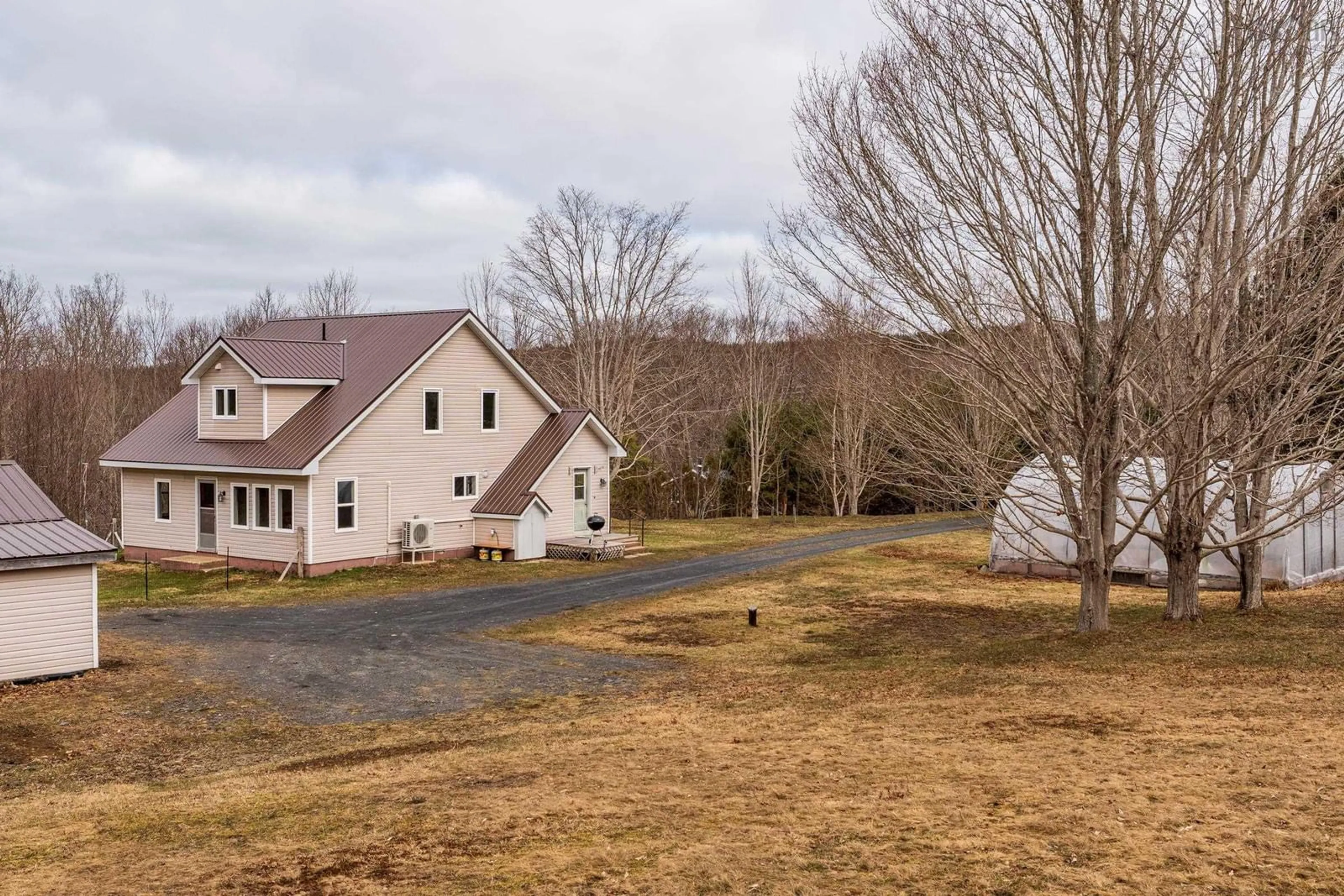 A pic from outside/outdoor area/front of a property/back of a property/a pic from drone, unknown for 550 River Rd, Bear River Nova Scotia B0S 1B0