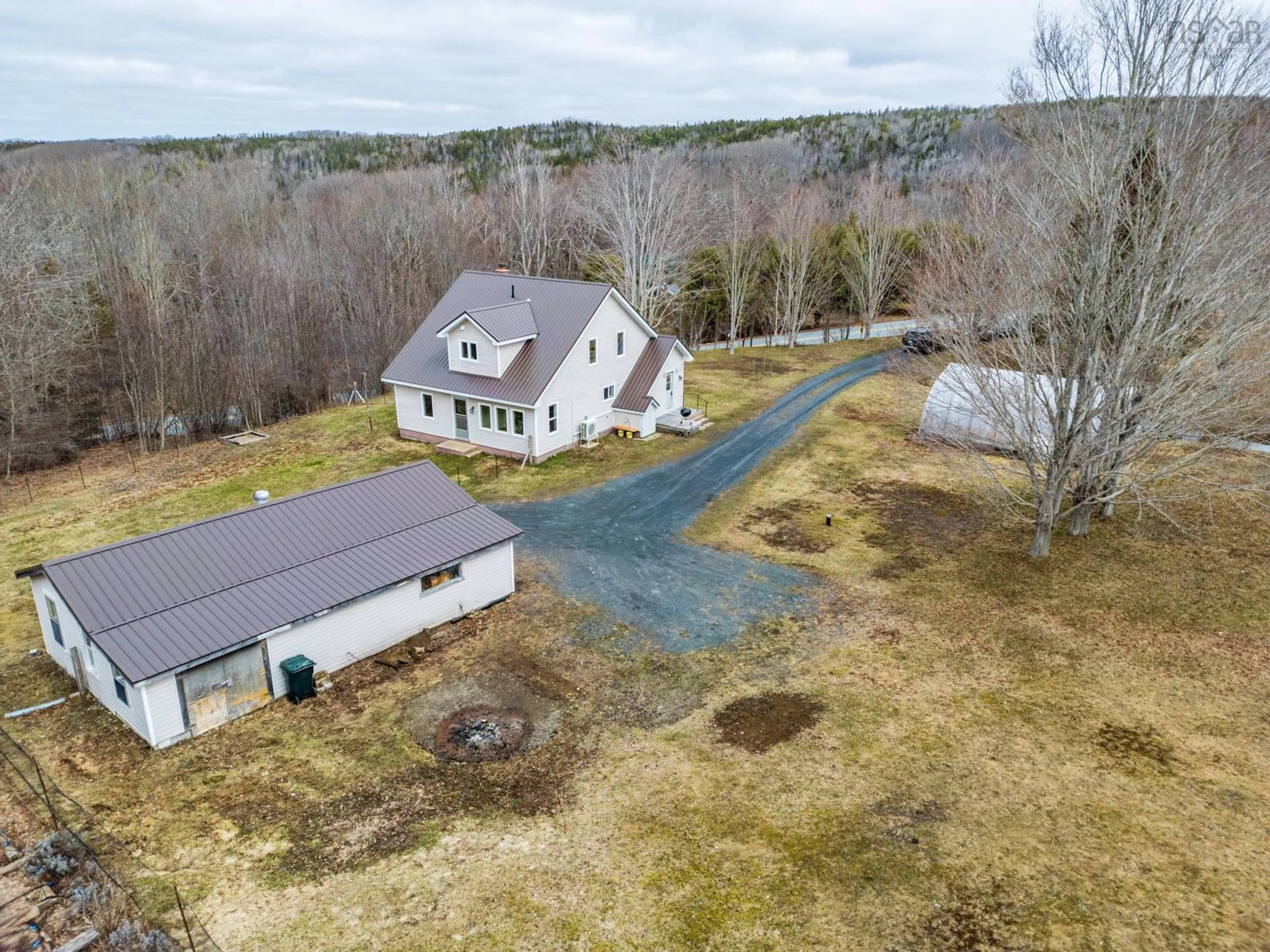 A pic from outside/outdoor area/front of a property/back of a property/a pic from drone, unknown for 550 River Rd, Bear River Nova Scotia B0S 1B0