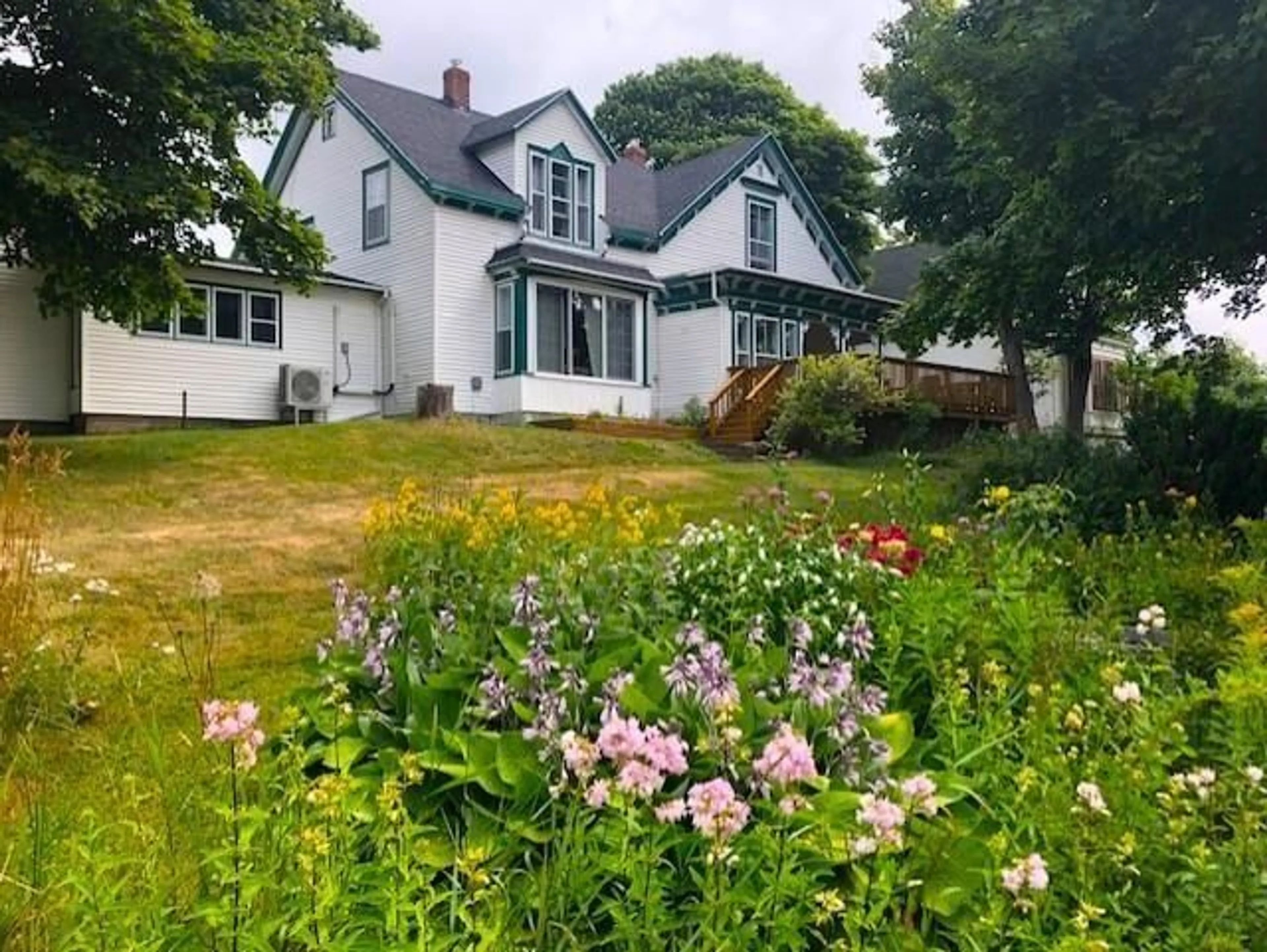 A pic from outside/outdoor area/front of a property/back of a property/a pic from drone, street for 30 Lovers Lane, Port Hastings Nova Scotia B9A 1N3