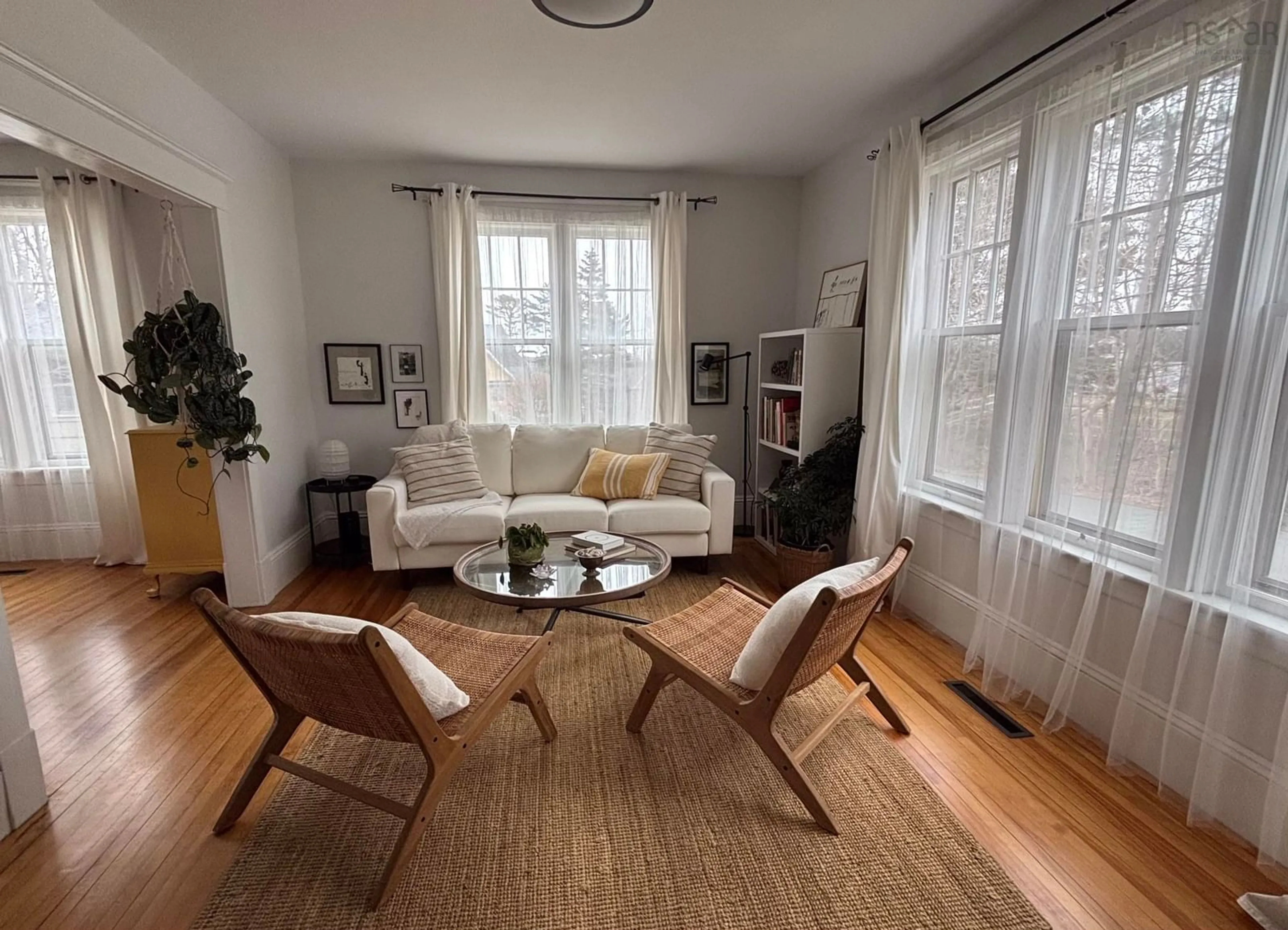 Living room with furniture, wood/laminate floor for 32 Old Falls Rd, Liverpool Nova Scotia B0T 1K0