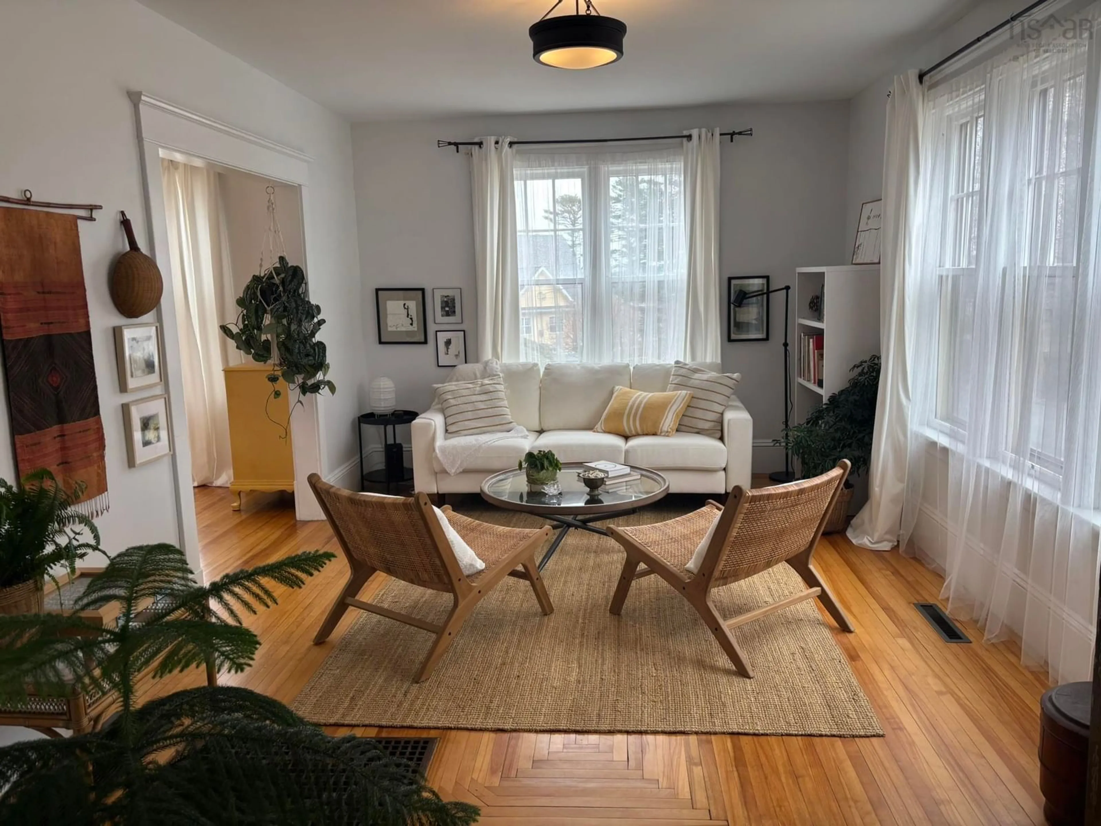 Living room with furniture, wood/laminate floor for 32 Old Falls Rd, Liverpool Nova Scotia B0T 1K0