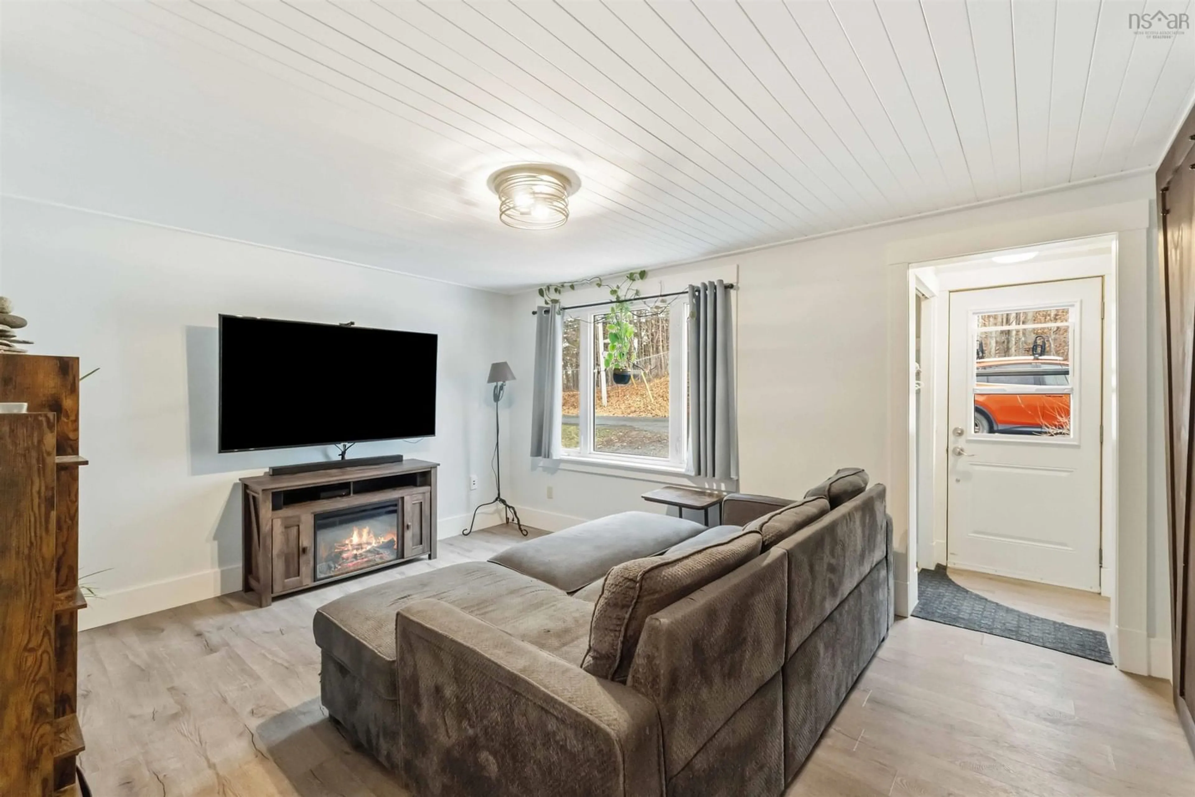 Living room with furniture, wood/laminate floor for 363 Canaan Ave, Kentville Nova Scotia B4N 0J9