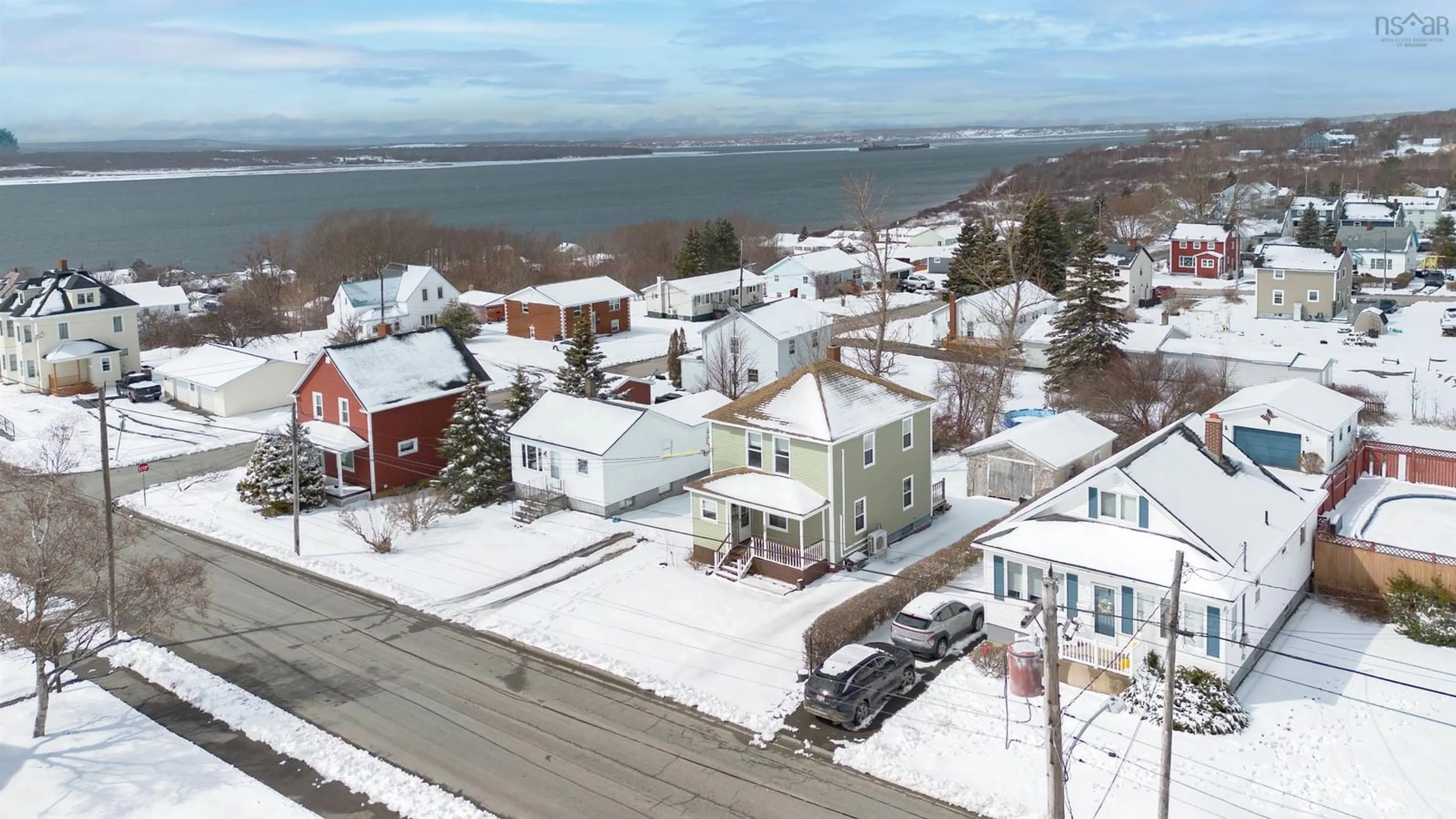 A pic from outside/outdoor area/front of a property/back of a property/a pic from drone, street for 133 Broadway, Sydney Nova Scotia B1N 2Y7