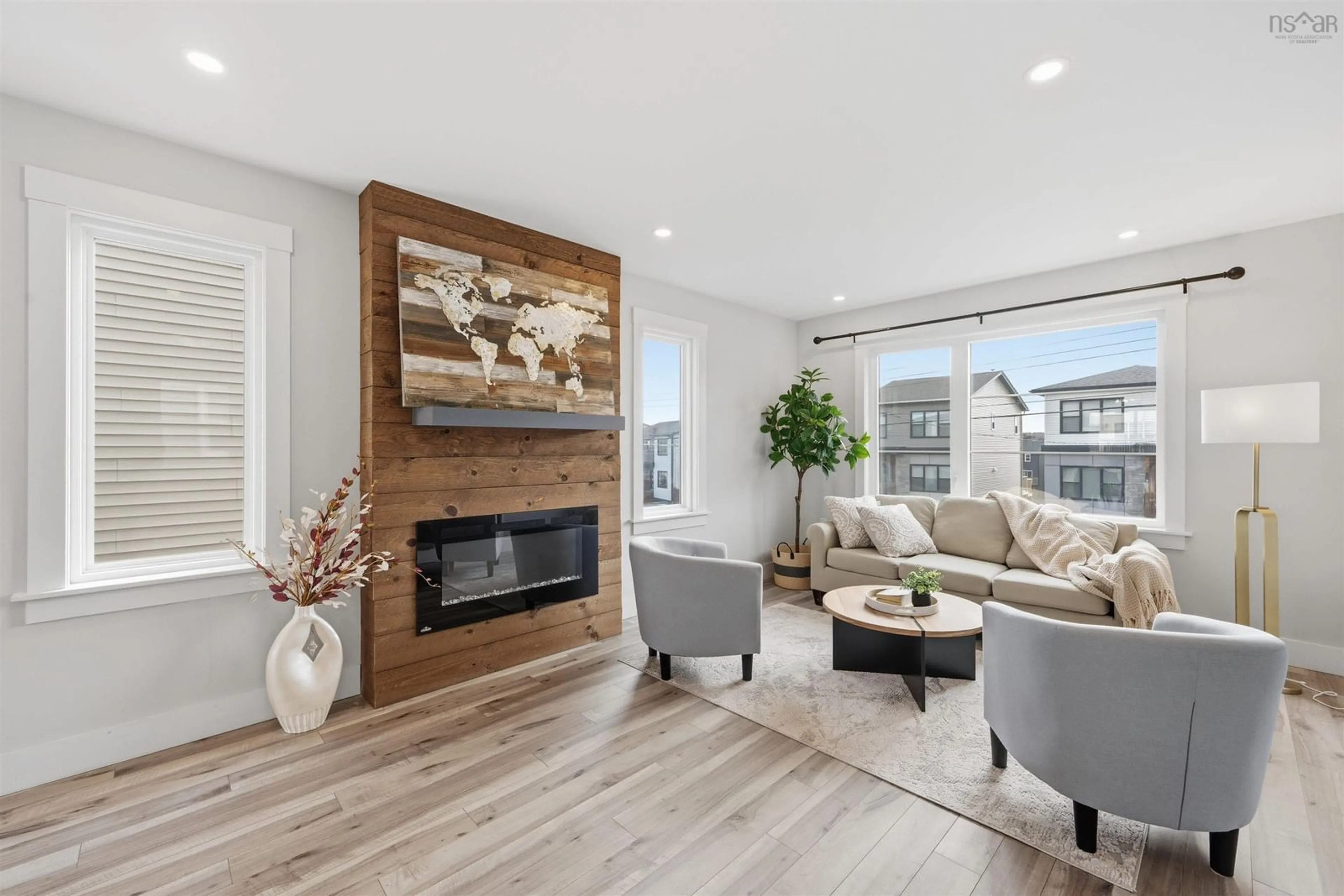 Living room with furniture, wood/laminate floor for 31 Travertine Crt, Halifax Nova Scotia B3P 0J5