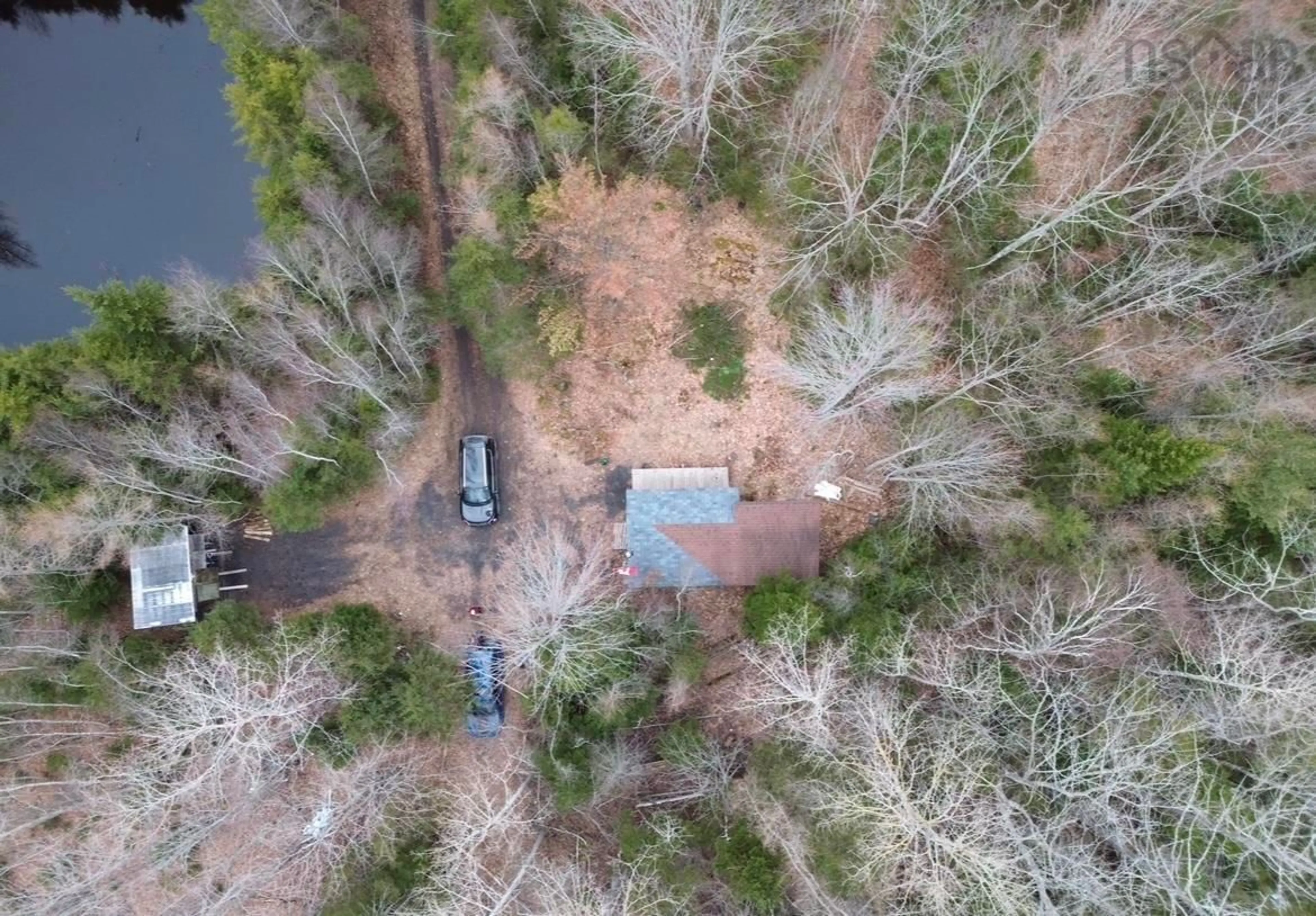 A pic from outside/outdoor area/front of a property/back of a property/a pic from drone, forest/trees view for 115 Bennie Muckle Rd, Bramber Nova Scotia B0N 2R0