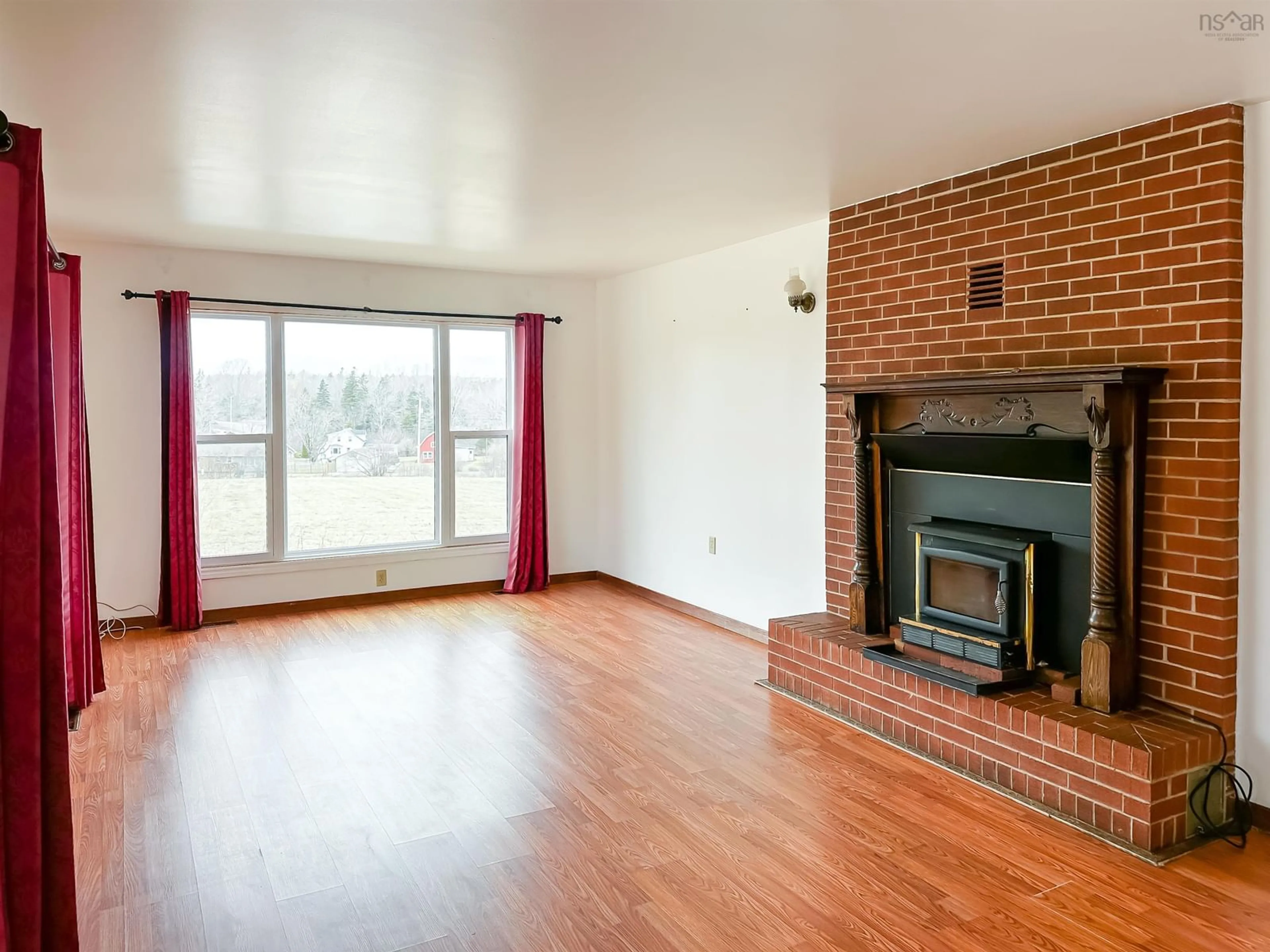 Living room with furniture, wood/laminate floor for 1317 Gospel Rd, Glenmont Nova Scotia B0P 1H0